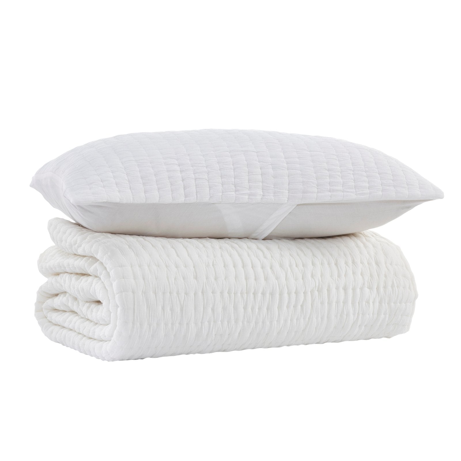 QT-359-9496-LOT1_7|Stacked white textured quilt and matching pillow sham for a cozy bedroom, featuring soft, inviting fabric and modern design.