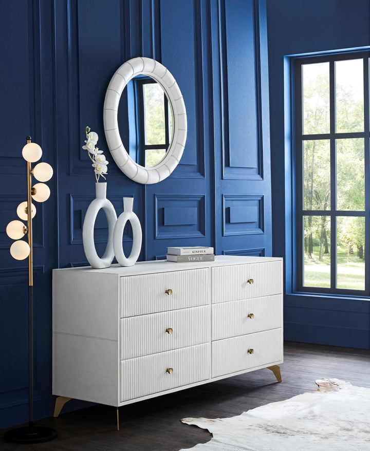 FN-5203-642033_1|White modern six-drawer dresser with ribbed texture and gold pulls in a chic blue room, stylish storage solution.