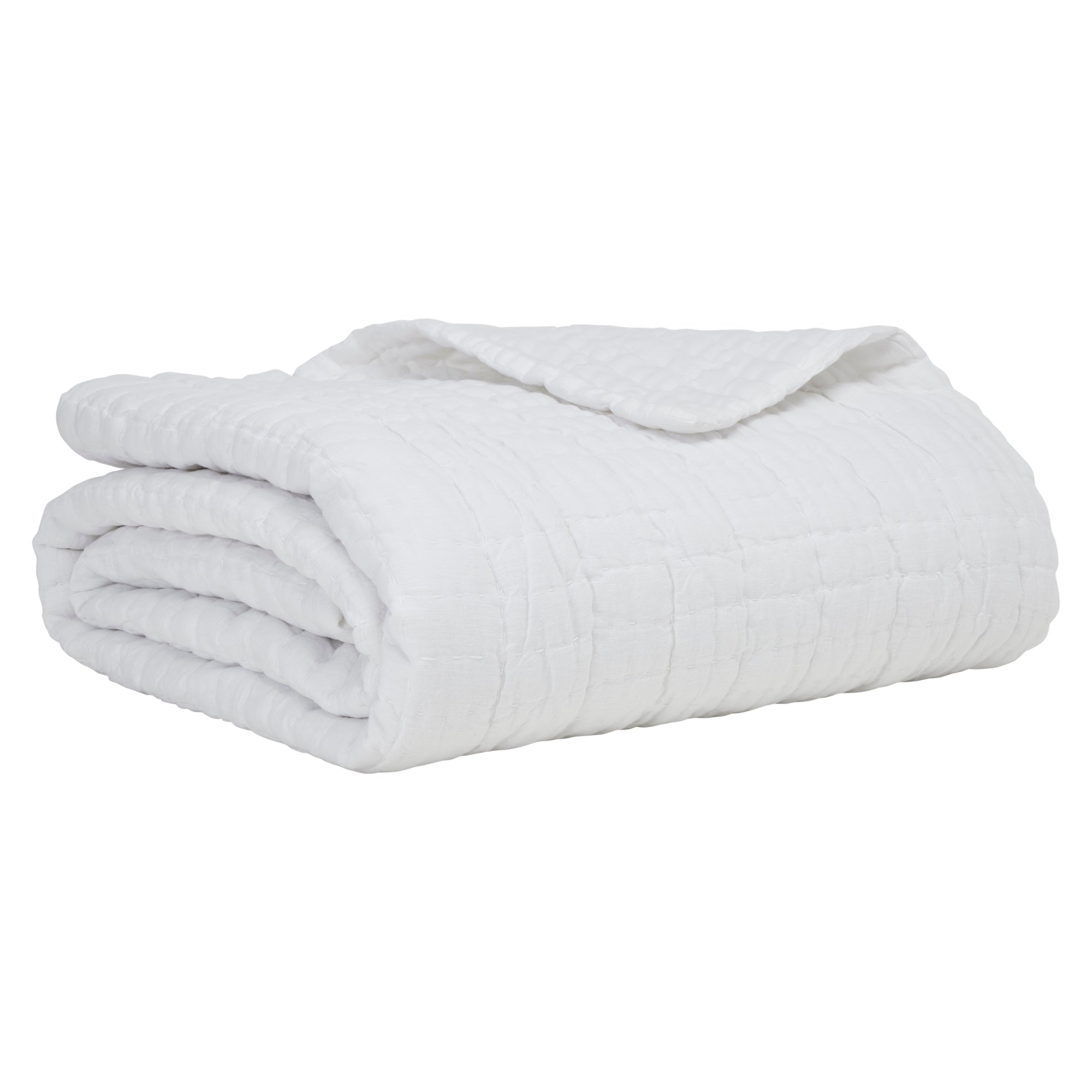 QT-372-11096_6|Beautifully folded white textured quilt, highlighting its soft, plush feel and elegant design. Perfect for cozy nights.