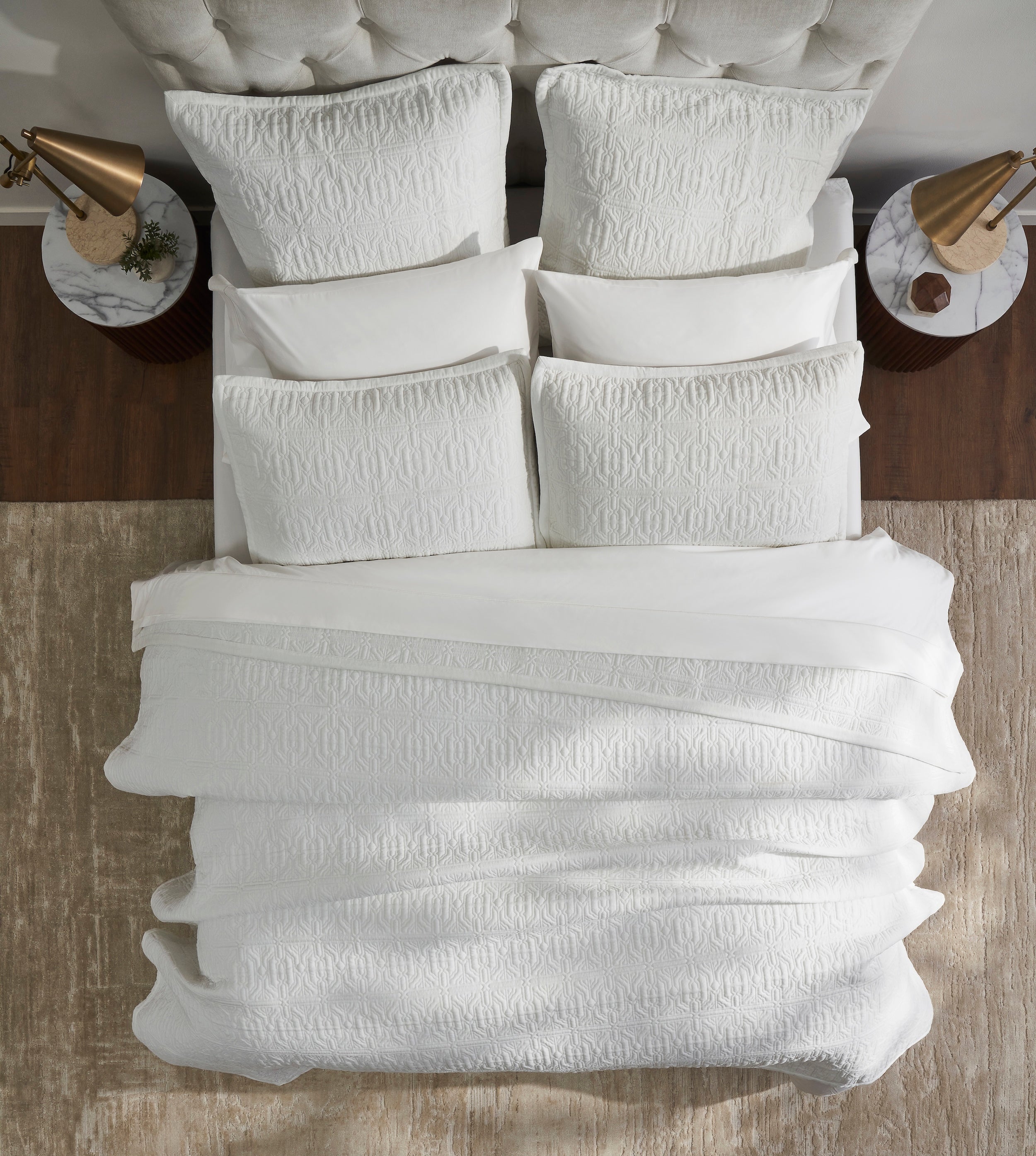 QT-376-9496_4|Top-down view of white quilted bedding, geometric pattern. Cozy and elegant quilt for a modern bedroom, adds sophisticated style.