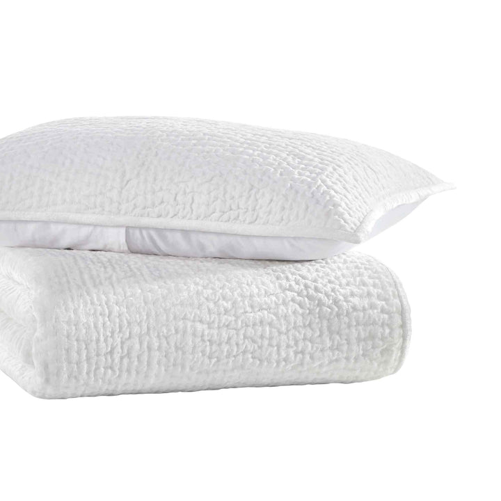 CL-182-11898_2|Folded white textured coverlet and matching quilted pillow, soft cotton bedding for elegant bedroom decor. (117 chars)