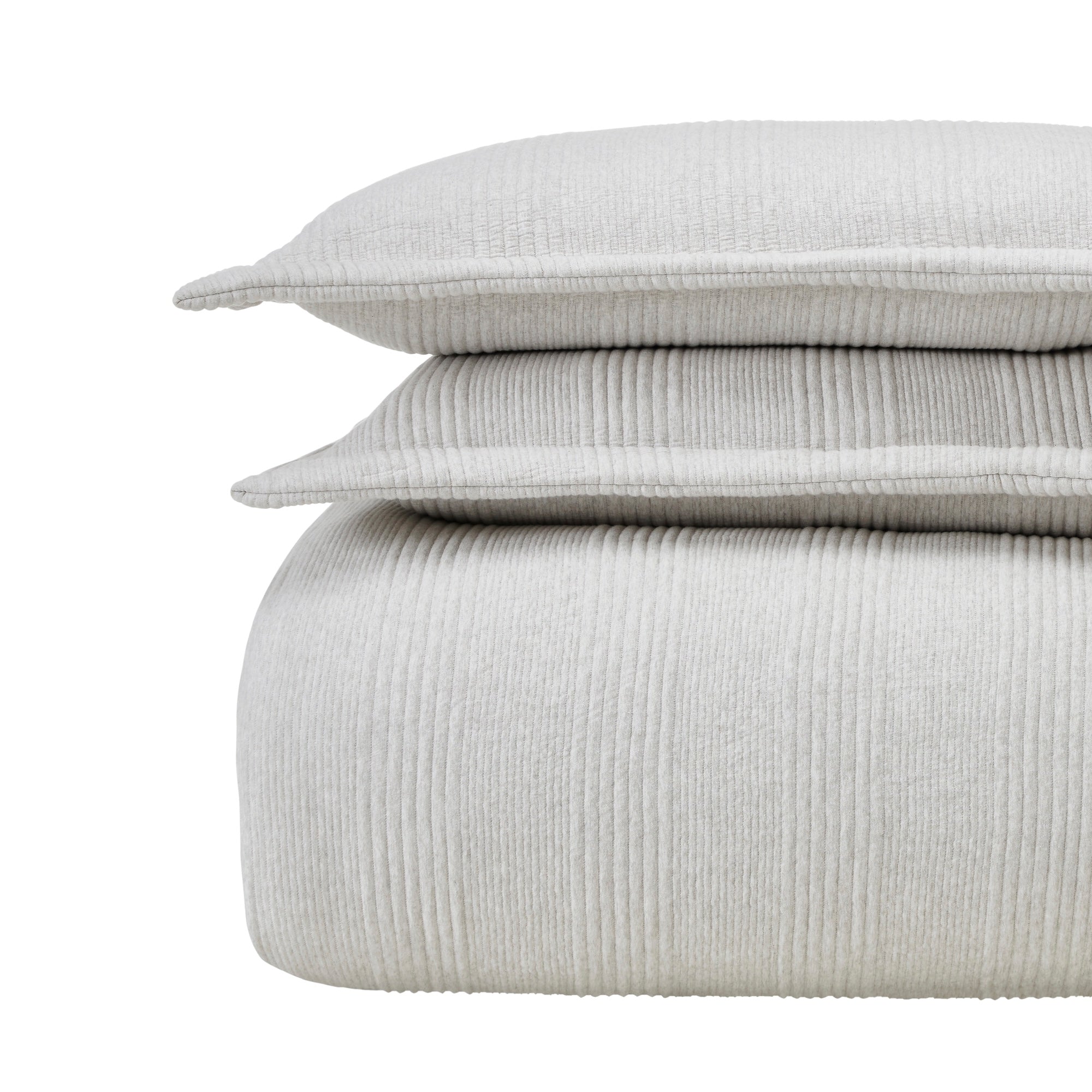 DT-044-10692_5|Stacked light grey ribbed duvet cover and two textured pillow shams, offering cozy comfort and modern style for any bedroom.