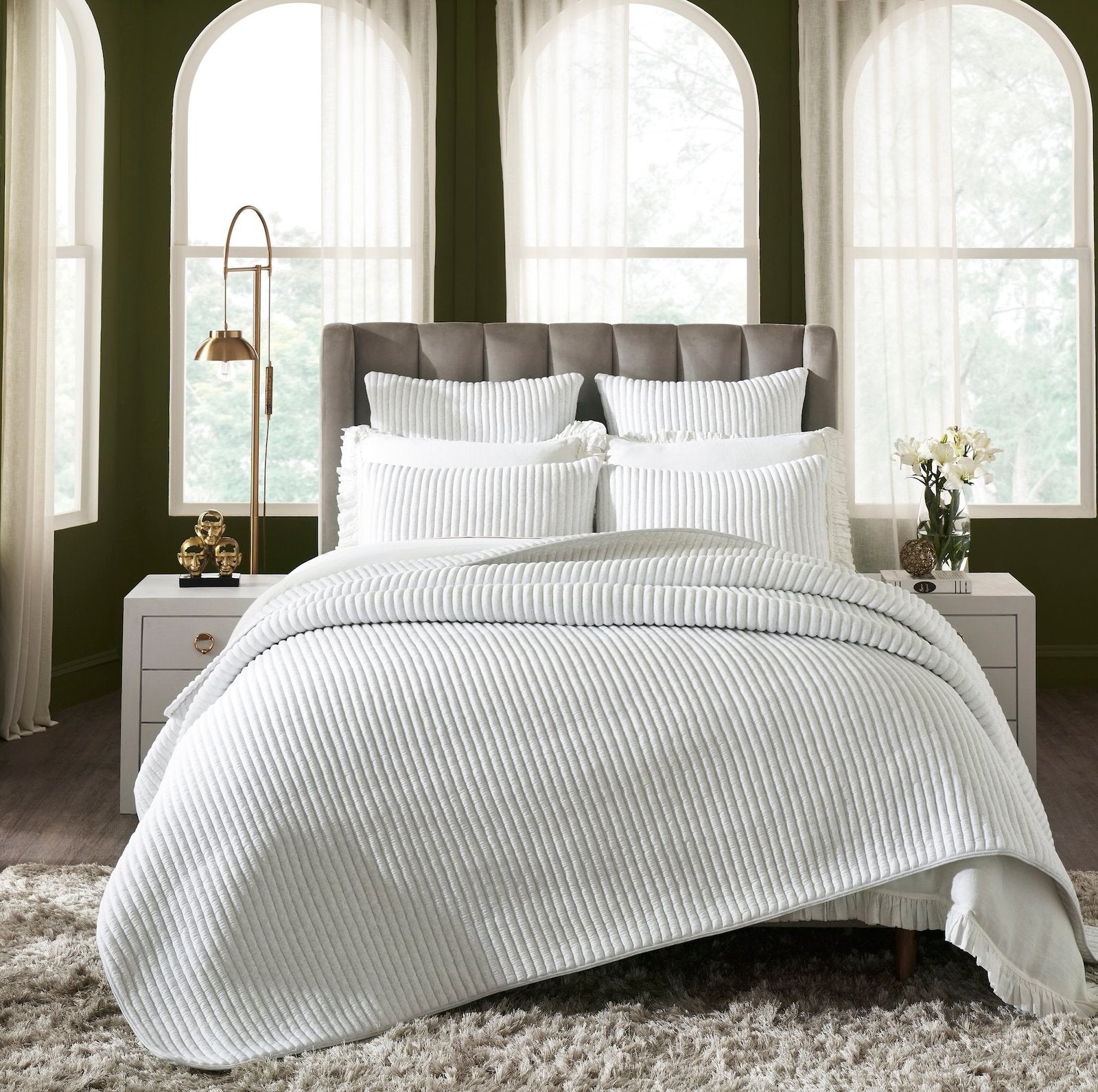 QT-367-9496_2|Elegant white corduroy textured quilt draped over a bed, offering a cozy and modern aesthetic to any bedroom.