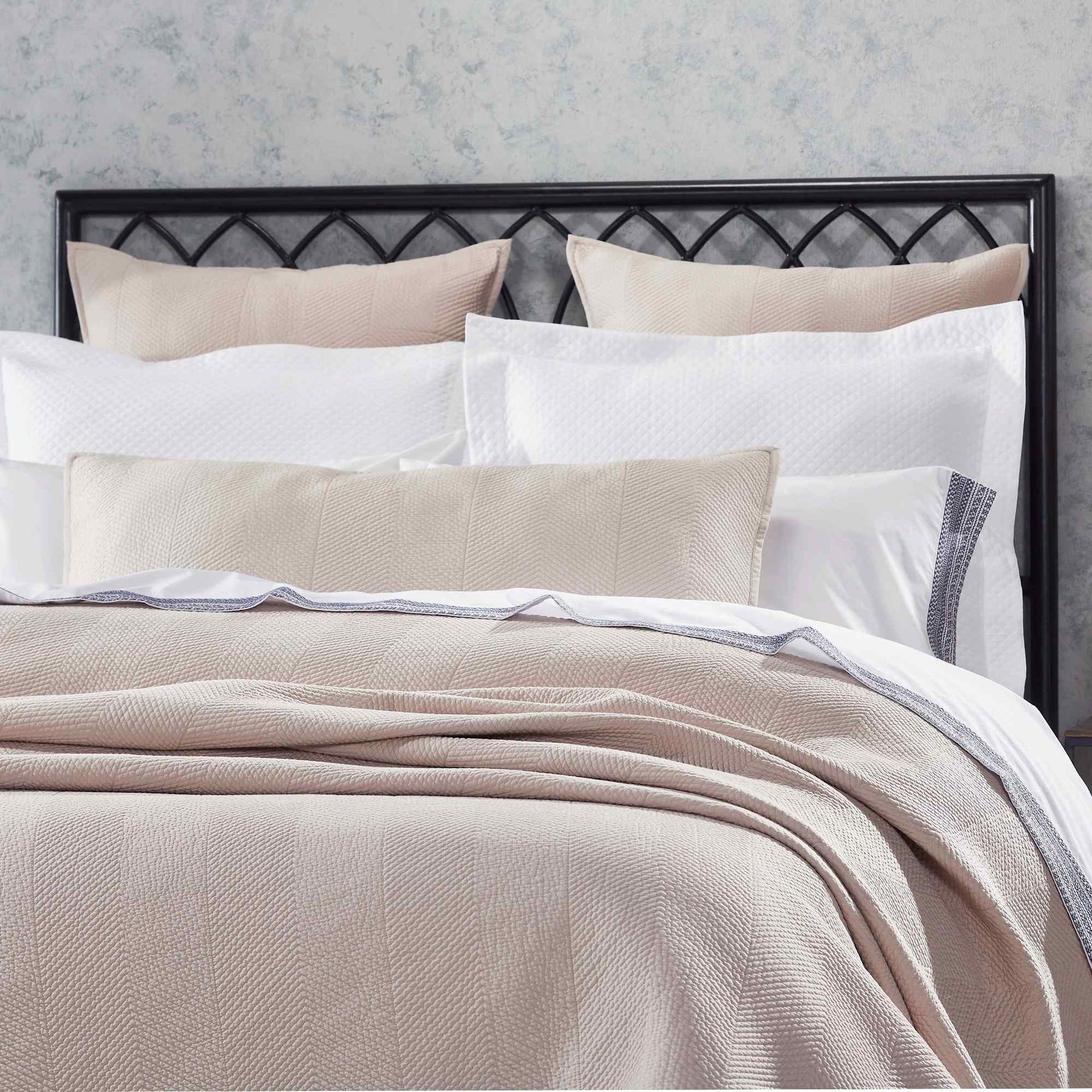 CL-170-X_2|Close-up of elegant neutral beige chevron coverlet. Luxurious textured bedding for a sophisticated and inviting bedroom.