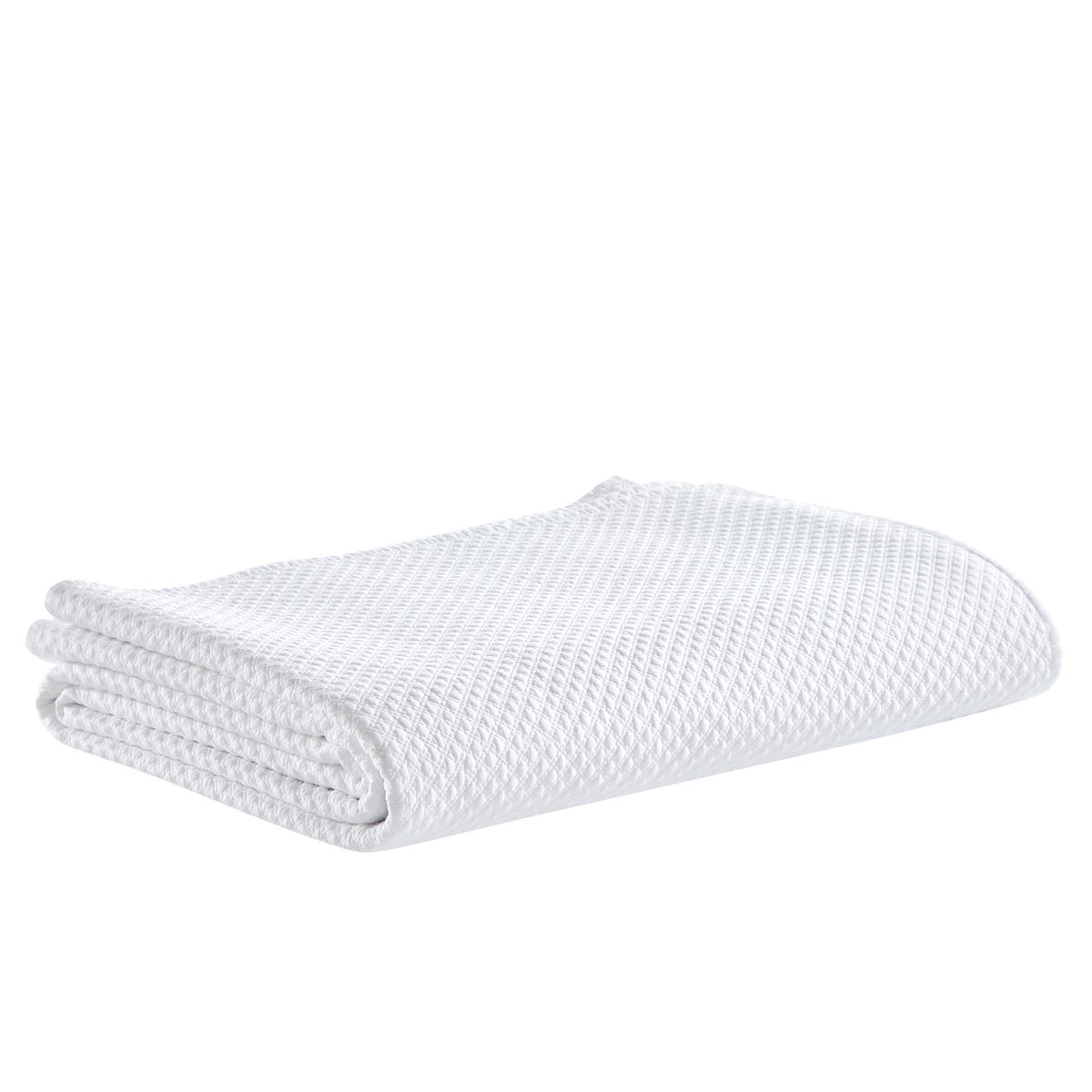 CL-200-9496_5|Neatly folded white textured coverlet, ideal for a contemporary bedroom, adding subtle dimension and comfort.
