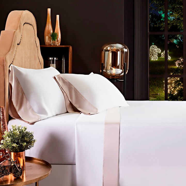KSS-512-7880_1|Elegant white 100% Lyocell sheets with a refined beige trim, offering a silky, breathable, and eco-friendly sleep experience.