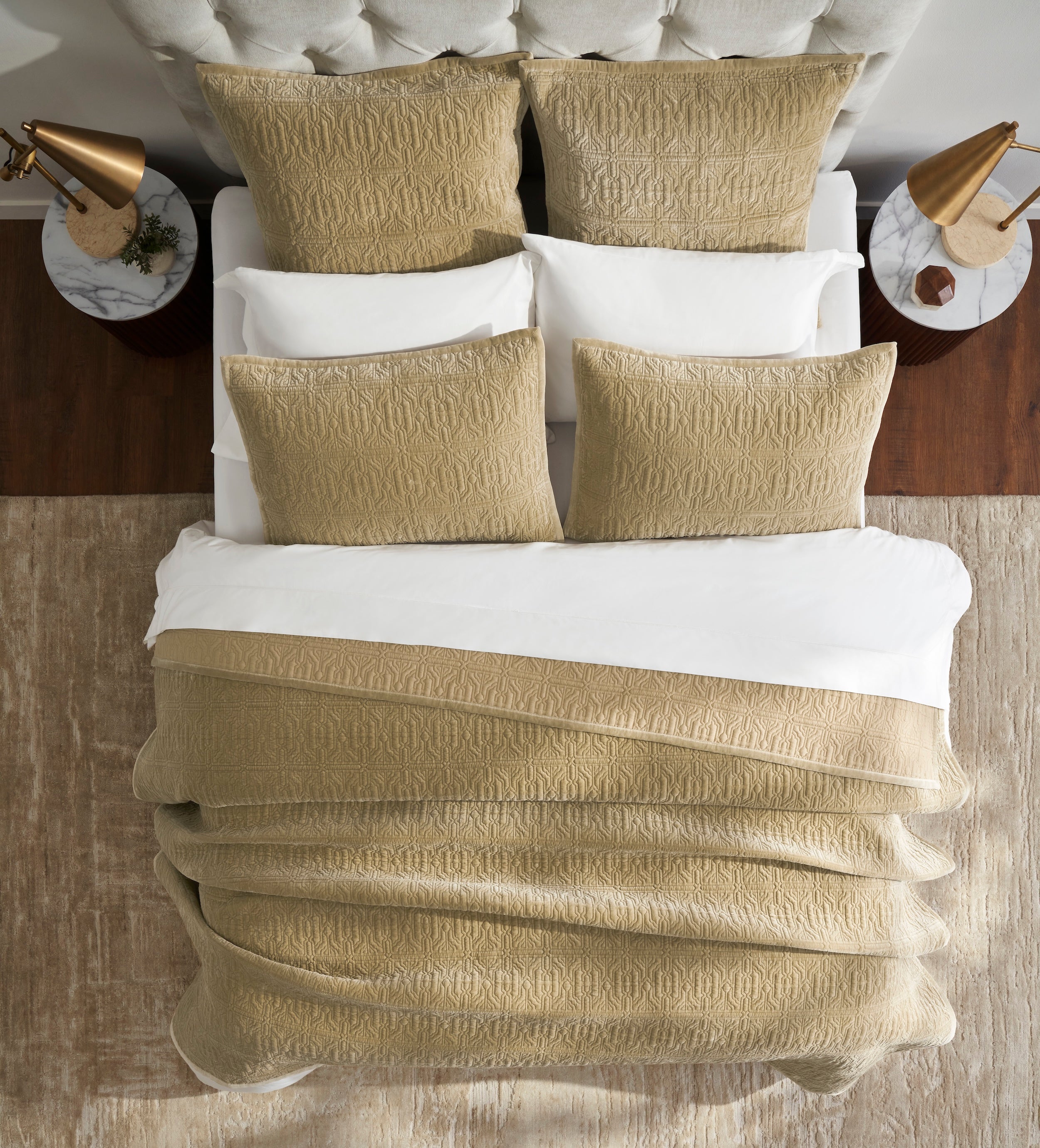QT-377-9496_4|Elegant tan quilted bedspread with a geometric pattern, draped over a bed with white sheets and pillows, enhancing cozy bedroom decor.