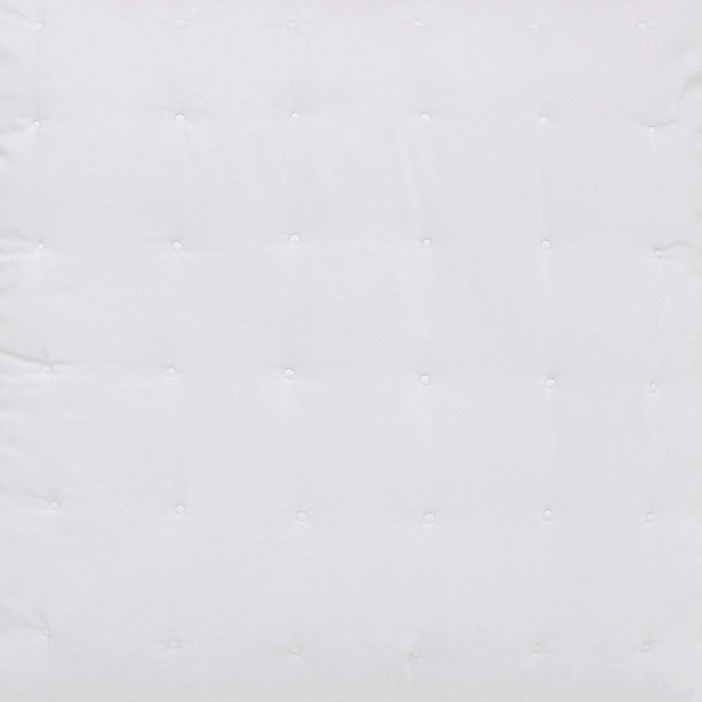 ES-353-2626_2|Close-up of a crisp white quilted pillow, showcasing its clean, soft texture and classic grid stitch pattern.