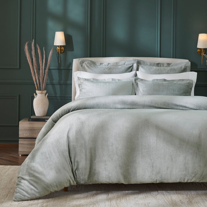 DT-054-10692_1|Elegant light green velvet textured duvet cover and matching pillow shams draped on a bed in a stylish bedroom.