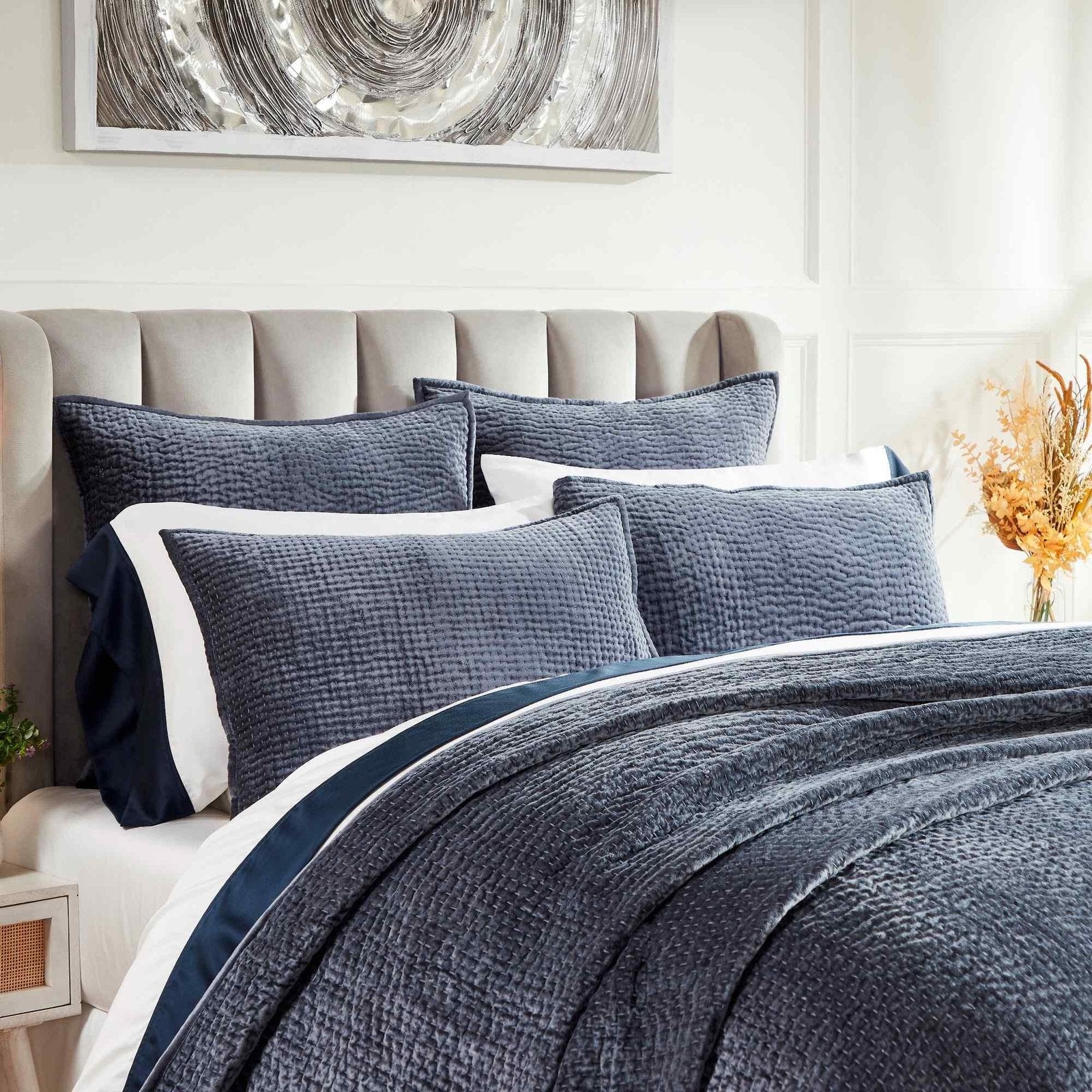 CL-195-9496_3|Close-up of luxurious navy blue quilted coverlet and coordinating pillows, highlighting rich texture and elegant bedroom style.