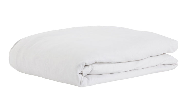 DT-023-10692_3|Neatly folded pure white cotton duvet cover, soft and breathable, ready to enhance any modern bedroom decor.