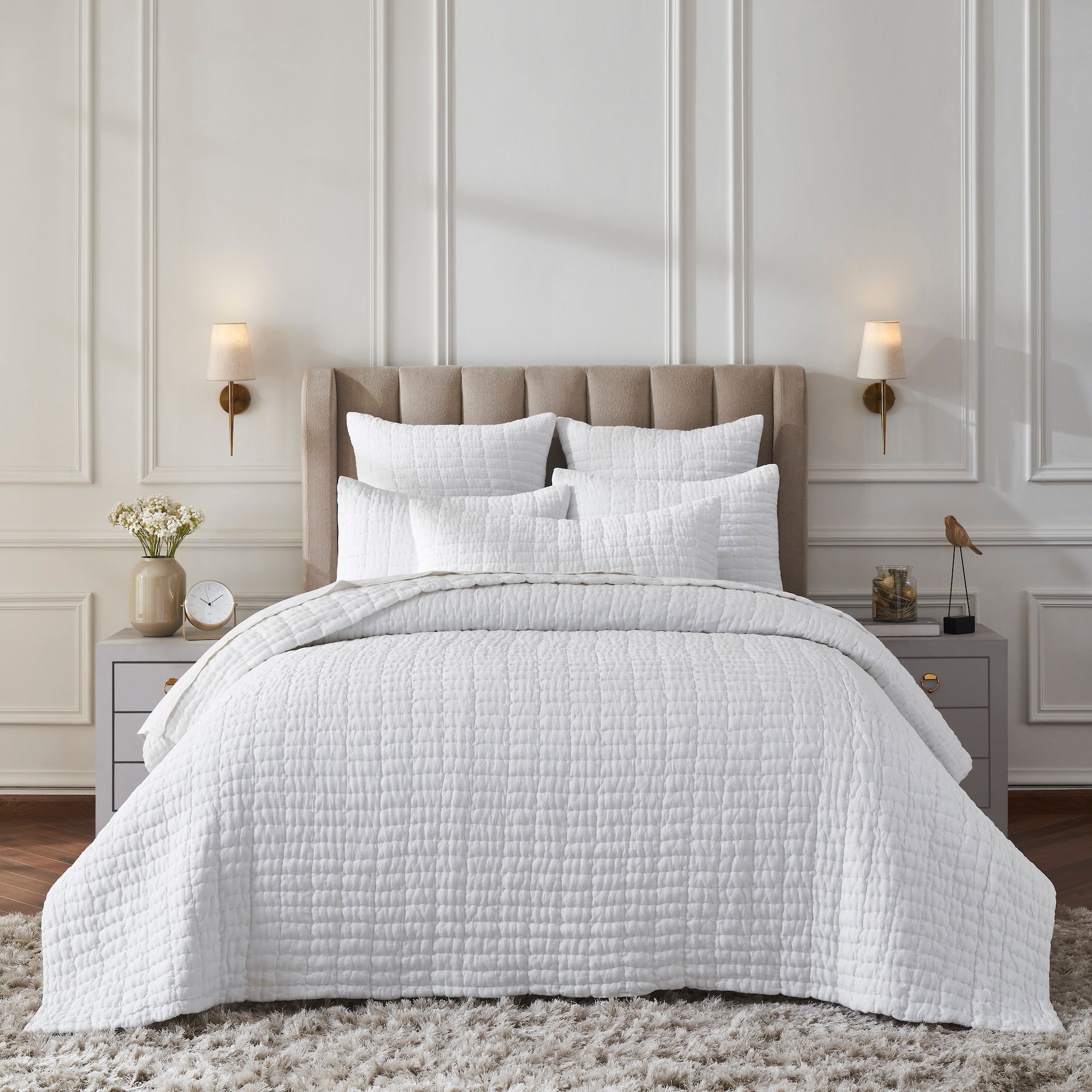 QT-372-X_1|Full bed styled with a white quilted bedspread, shams, and decorative pillows. Clean, minimalist, and serene bedroom decor.