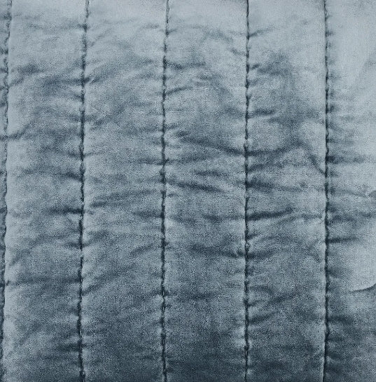 SWT-360-7.8_1|Luxurious grey-blue velvet quilted fabric with elegant vertical stitch lines, perfect for plush throws or sophisticated bedding.