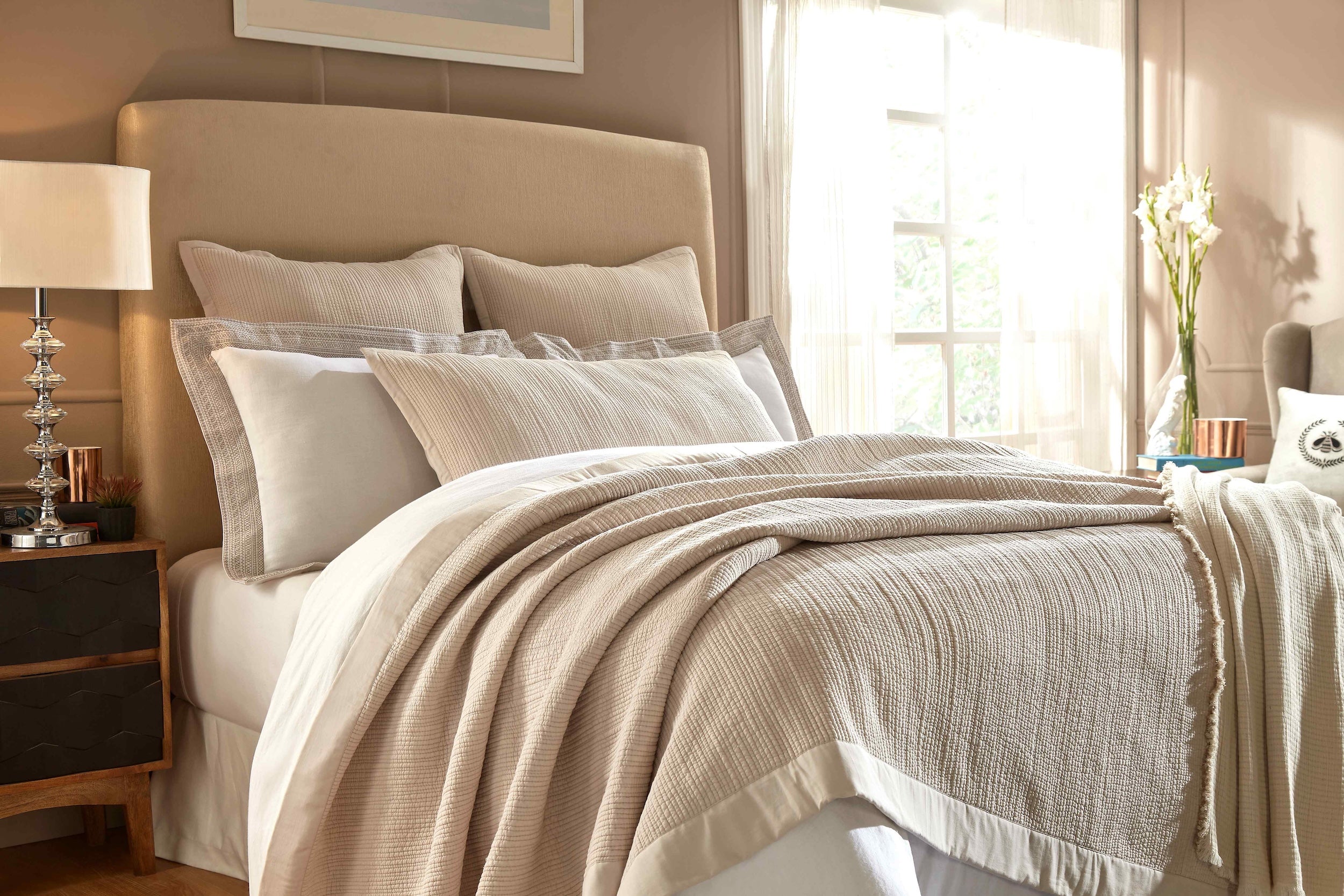 CL-161-11096_2|Elegant beige textured coverlet on a king-size bed, beautifully styled with complementary pillows for a cozy bedroom.