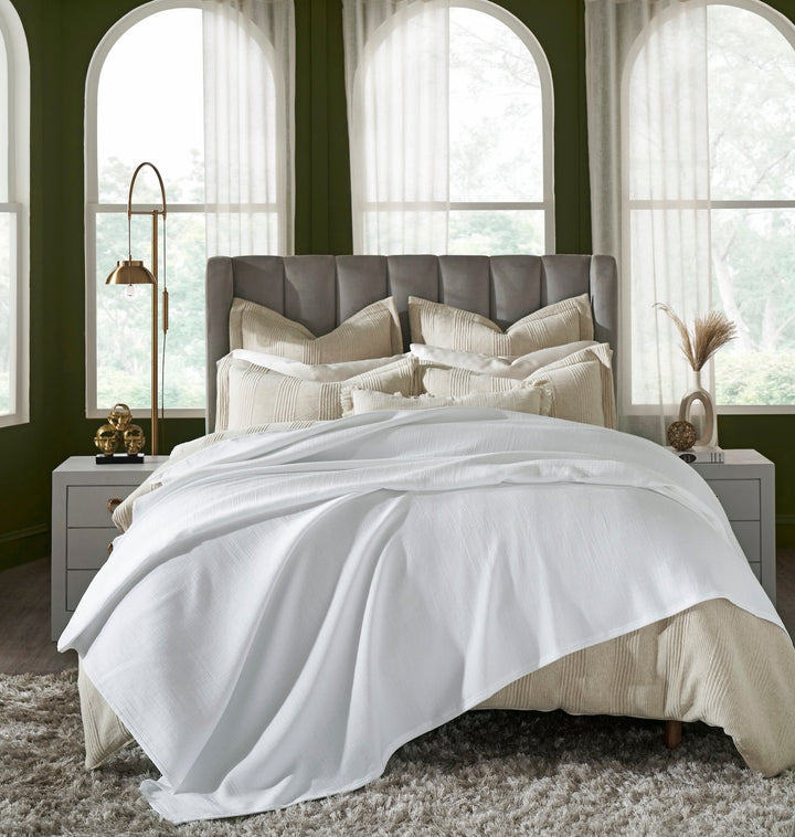 BL-858-11096_1|White lightweight textured blanket draped on a cozy beige bed, elegant throw for a modern bedroom. (114)