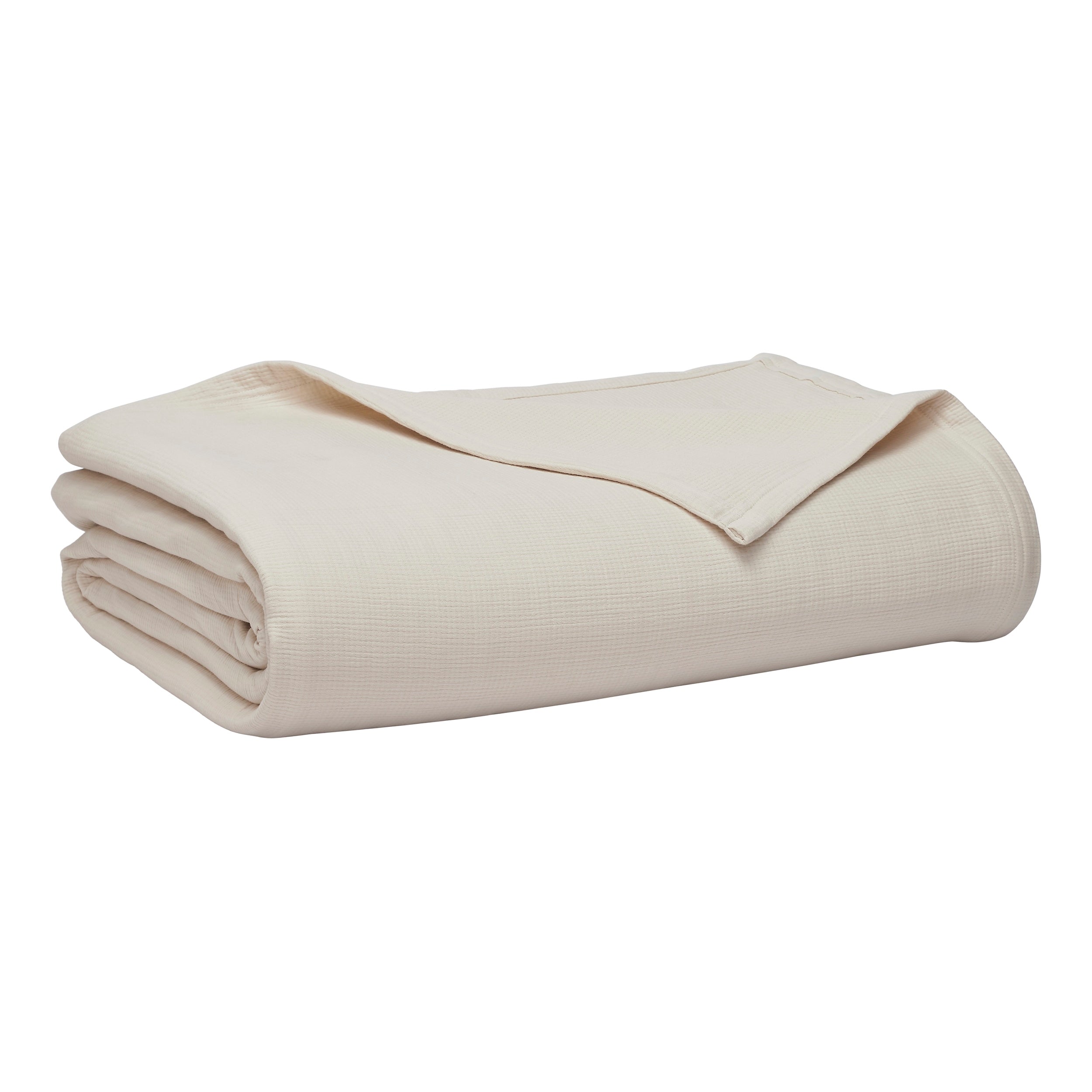 BL-860-11096_8|Elegantly folded cream waffle weave blanket, providing soft, breathable warmth and a stylish touch to any room. Home comfort.