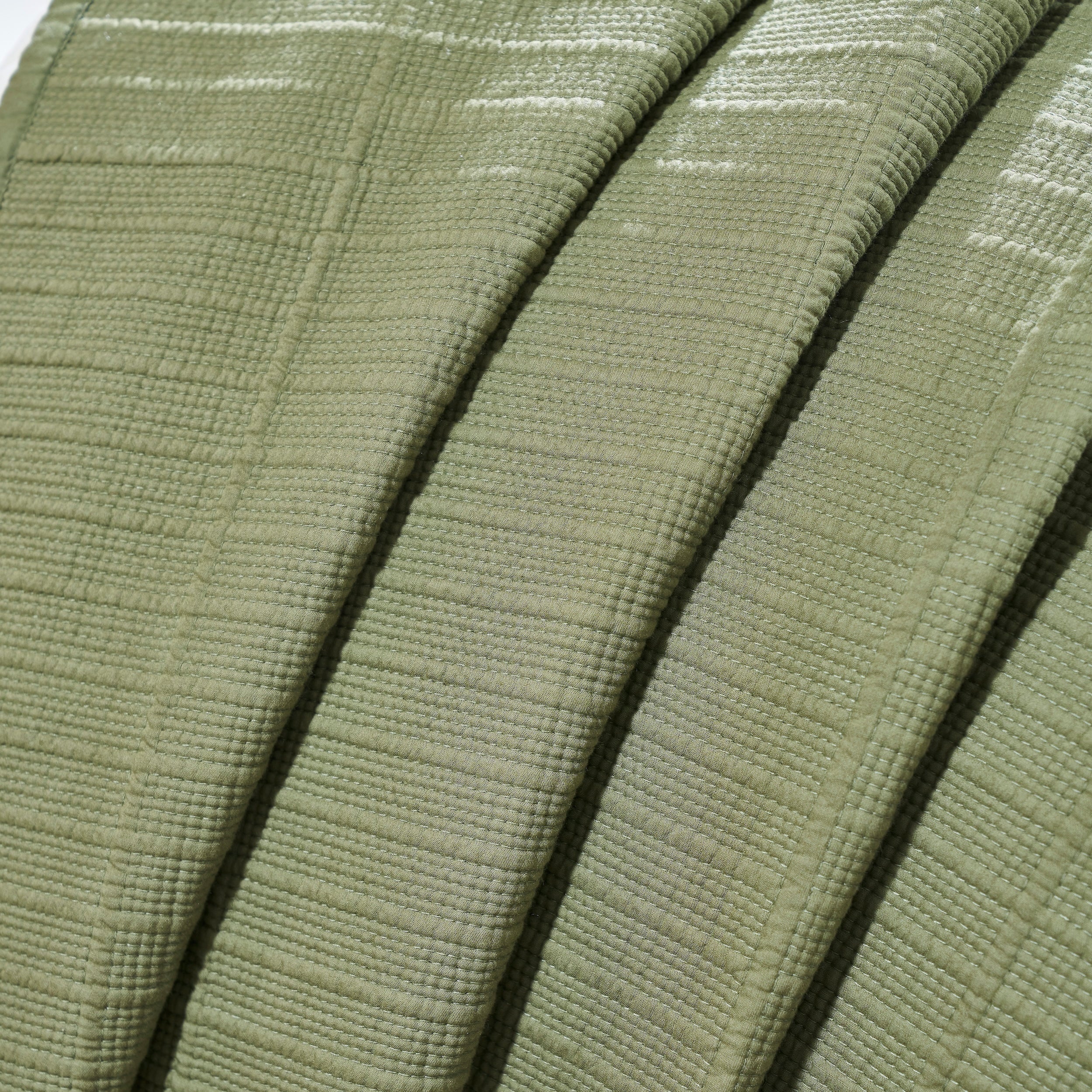 CL-270-11096_8|Folded sage green coverlet showcasing its breathable woven texture. Lightweight blanket for versatile use and warmth.