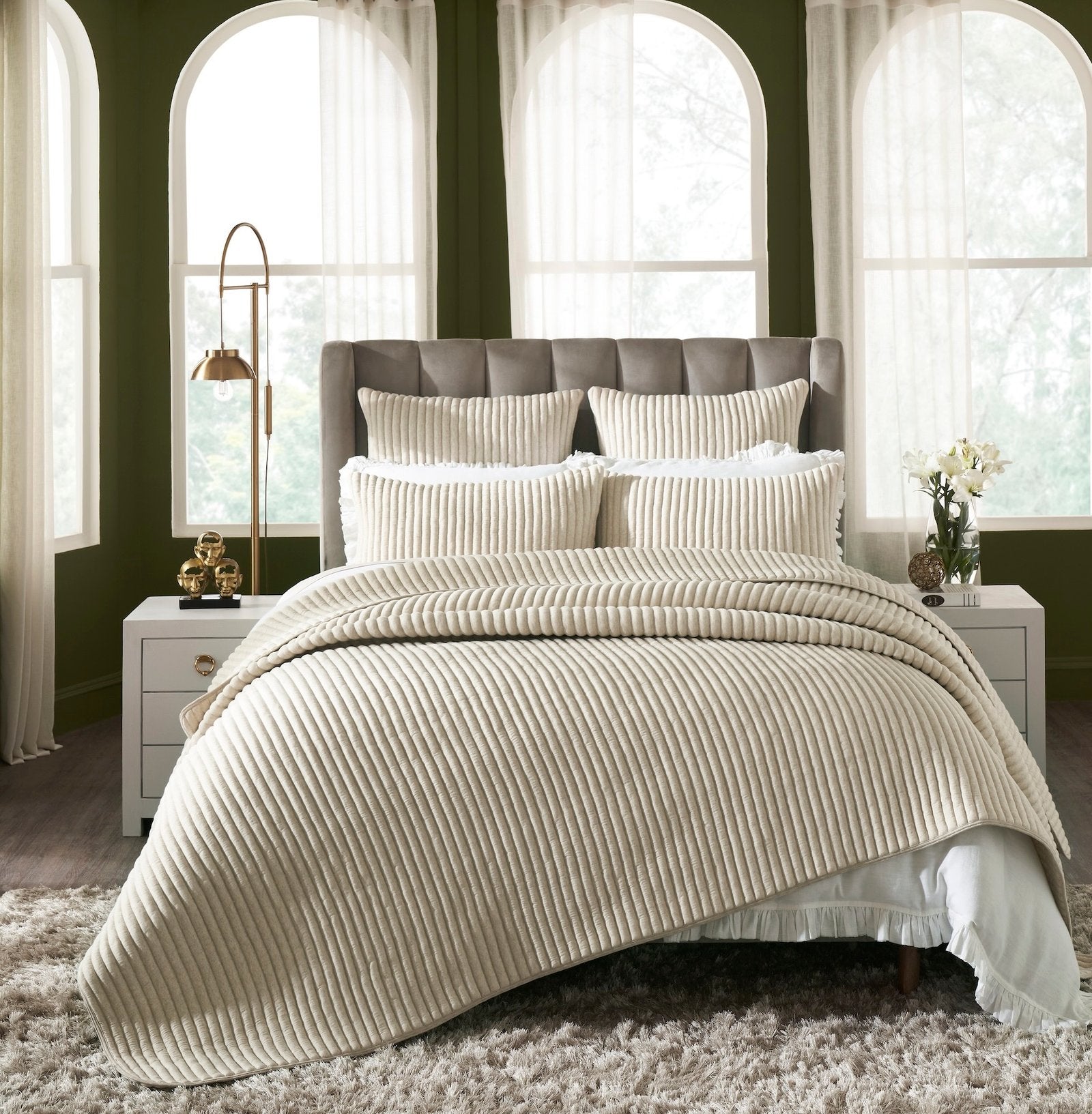 QT-368-9496_1|Luxurious beige ribbed velvet quilt on a stylish bed with matching pillows, adding elegance to the bedroom.