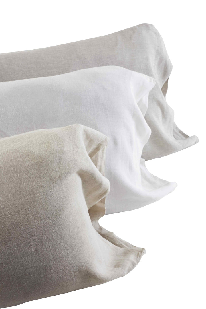 AKP-515-2040_3|Assortment of 100% Linen sheets in natural, white, and light grey shades. Soft, breathable, textured bedding options.