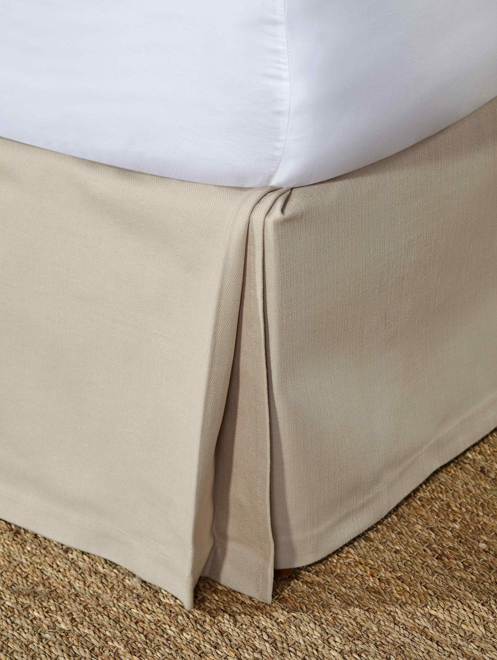 BS-109-7880_1|Light beige panel bed skirt featuring clean box pleats, providing a sophisticated and neat look to any bedroom setting.