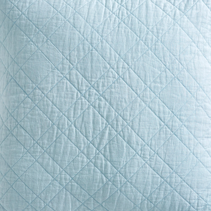 SWT-255-7.8_1|Serene light blue diamond-quilted fabric, a soft and inviting textile choice for serene bedroom decor and cozy accessories.