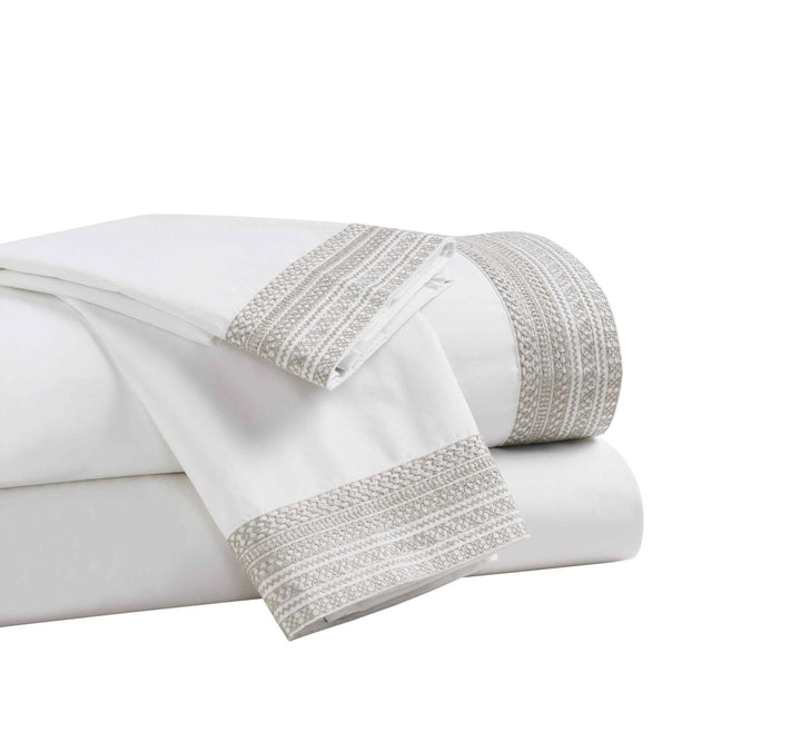CSS-501-7284_2|Stack of pure white 100% cotton sheets featuring a stylish woven grey trim, offering comfort and elegant design.