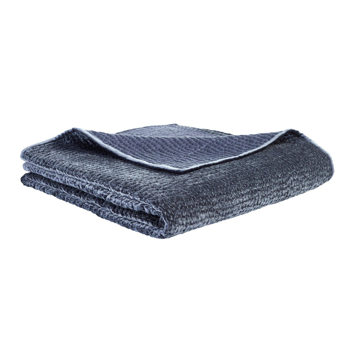 CL-195-11096_7|Dual-sided navy blue textured quilted coverlet, neatly folded, revealing its reversible design for flexible bedroom aesthetics.