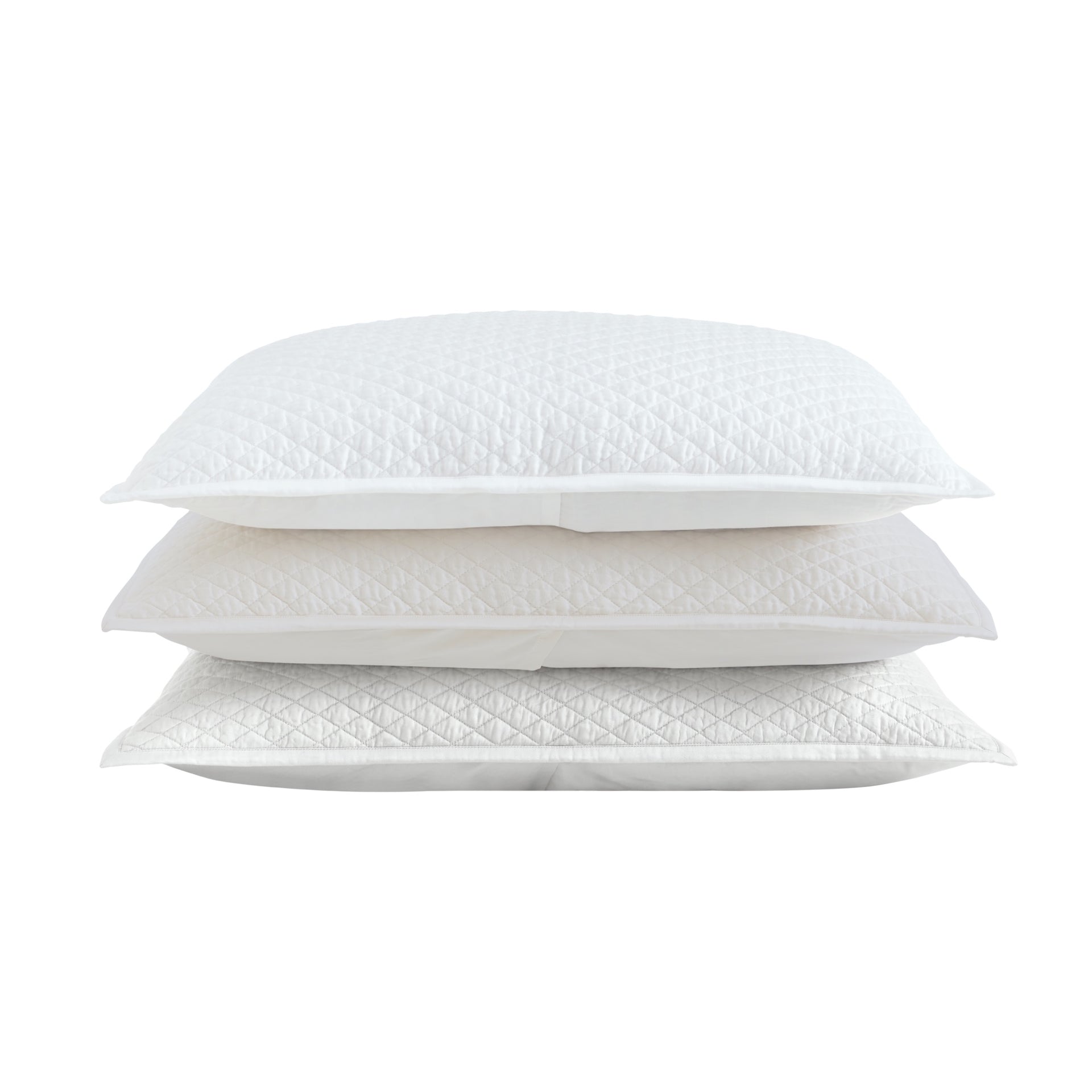 SS-264-X_2|Stacked white, cream, and silver quilted pillows featuring diamond stitching, premium soft comfort for bed styling.
