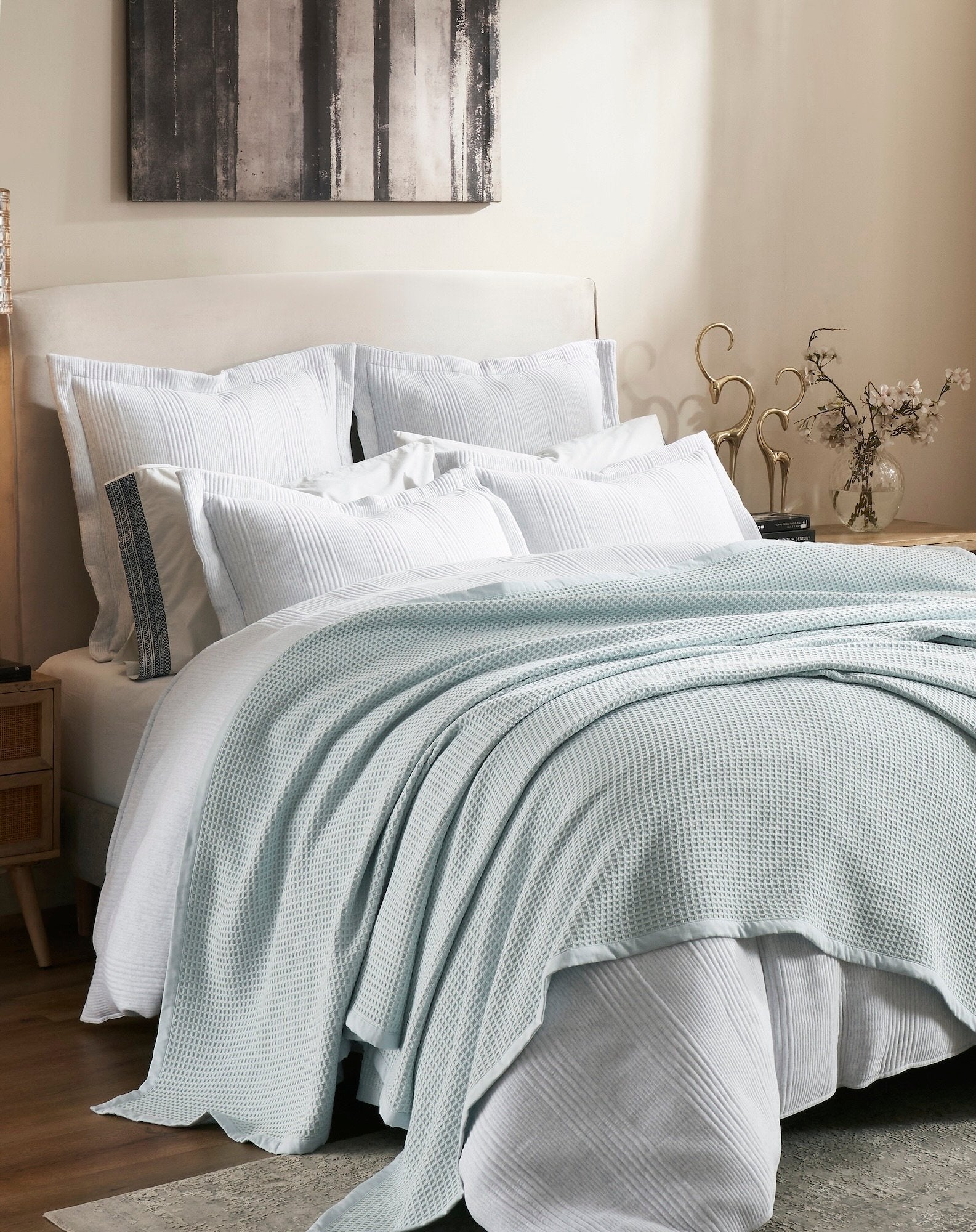 BL-857-9496_3|Light blue waffle knit blanket on a neatly made bed, providing cozy, elegant bedroom decor comfort. (112)