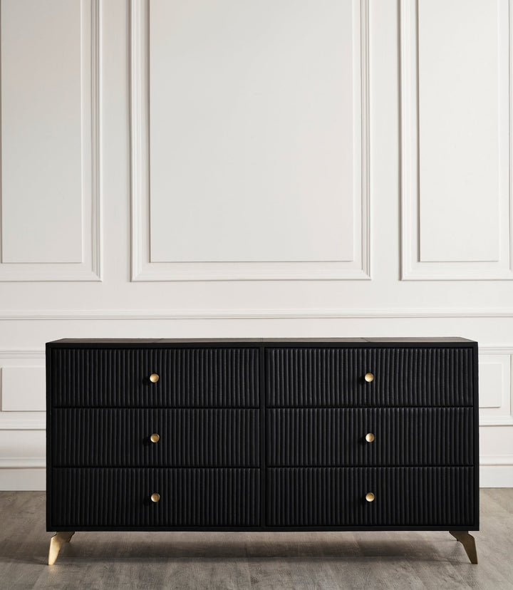 FN-5202-642033_3|Sophisticated black dresser featuring striking fluted texture, six drawers, and stylish gold pulls for modern homes.