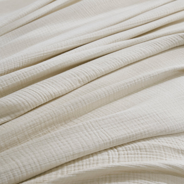 BL-862-11096_5|Close-up of a luxurious cream textured cotton blanket, perfect for cozy bedding and natural home decor. Soft and breathable quilt.