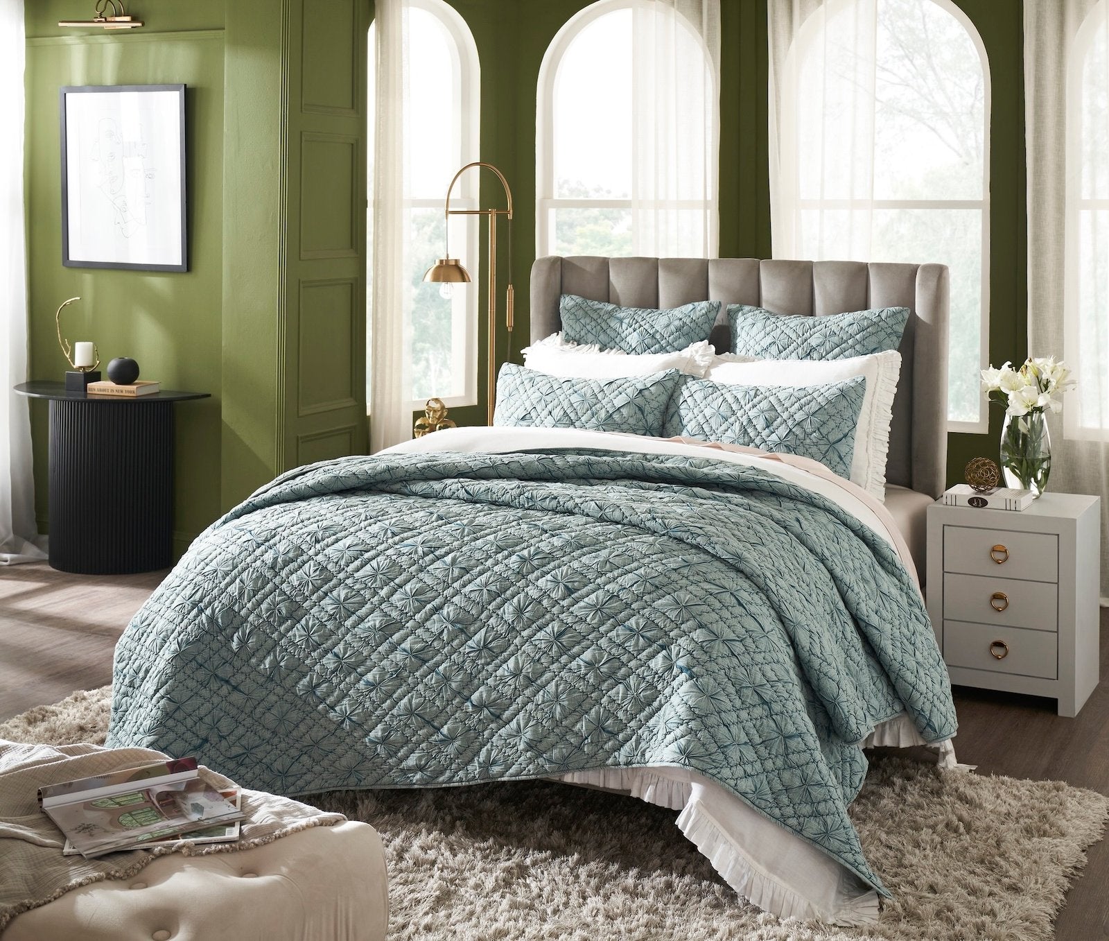 QT-365-11096_2|Elegant teal geometric quilted quilt on a bed with ruffled white sheets, enhancing a vibrant, stylish bedroom.