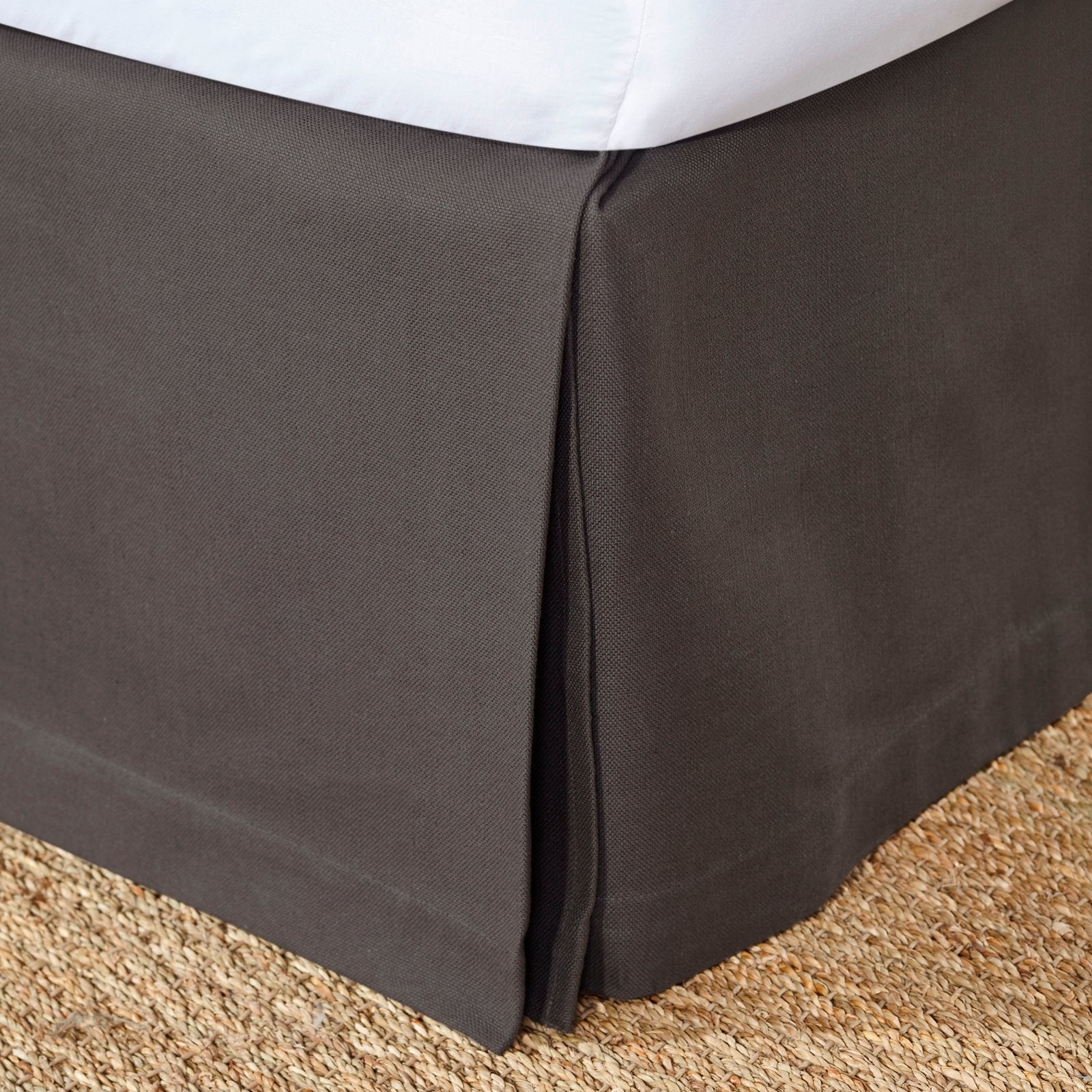 BS-106-7880_1|Tailored dark grey panel bed skirt with crisp box pleats, offering a modern, sleek foundation for any contemporary bed.