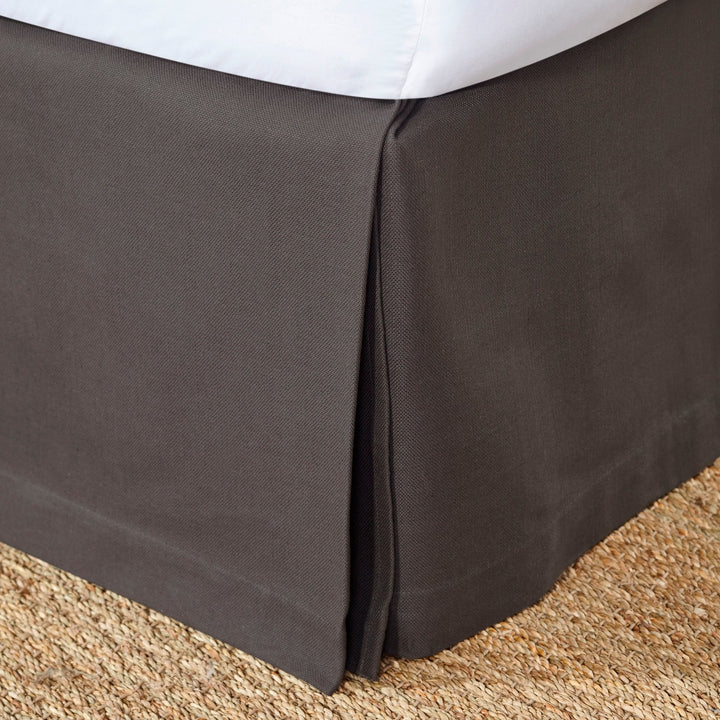 BS-106-7880_1|Tailored dark grey panel bed skirt with crisp box pleats, offering a modern, sleek foundation for any contemporary bed.