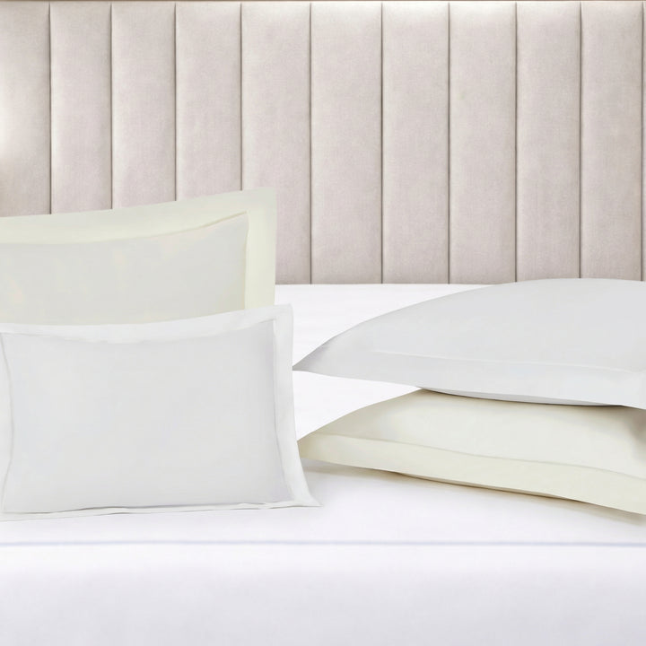 SS-065-X_2|Luxurious pure white cotton sateen duvet cover draped elegantly on a bed, creating a serene, inviting sleep space. Premium comfort.
