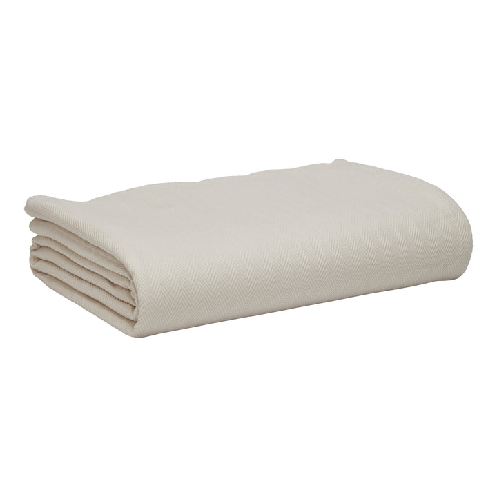 BL-866-9496_7|Folded light beige blanket with subtle herringbone weave, perfect for cozying up. Soft, warm bed linen for any home decor.