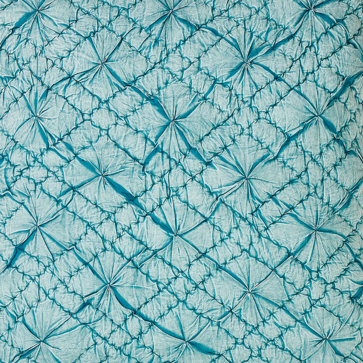 SWT-365-7.8_1|Vibrant teal ruched quilted fabric with a unique dimensional diamond and puff pattern, adding luxurious texture to bedding.