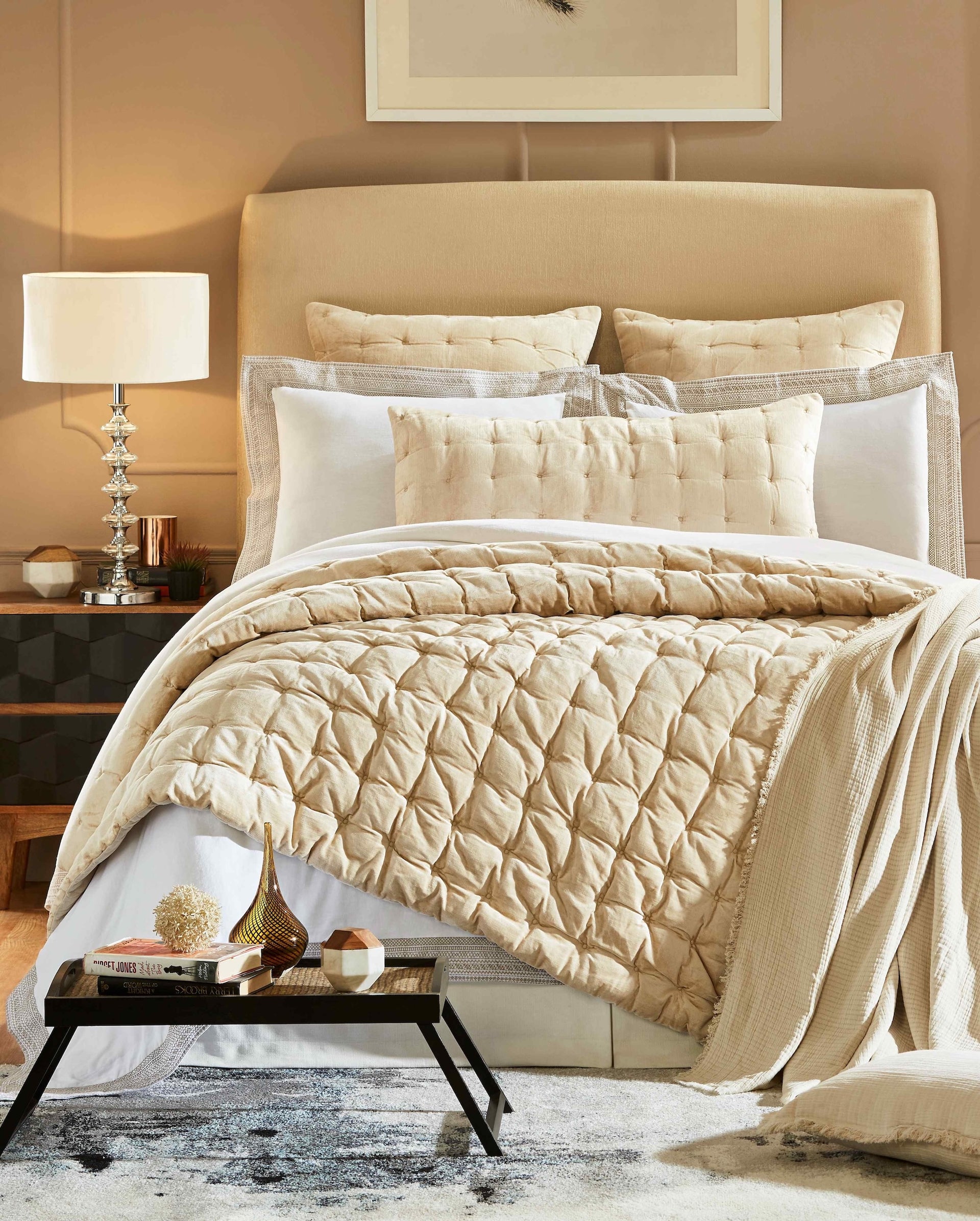 QT-314-9496-LOT1_1|Inviting beige quilt with a plush, textured diamond criss-cross stitch pattern, creating a warm, cozy bedroom ambiance.