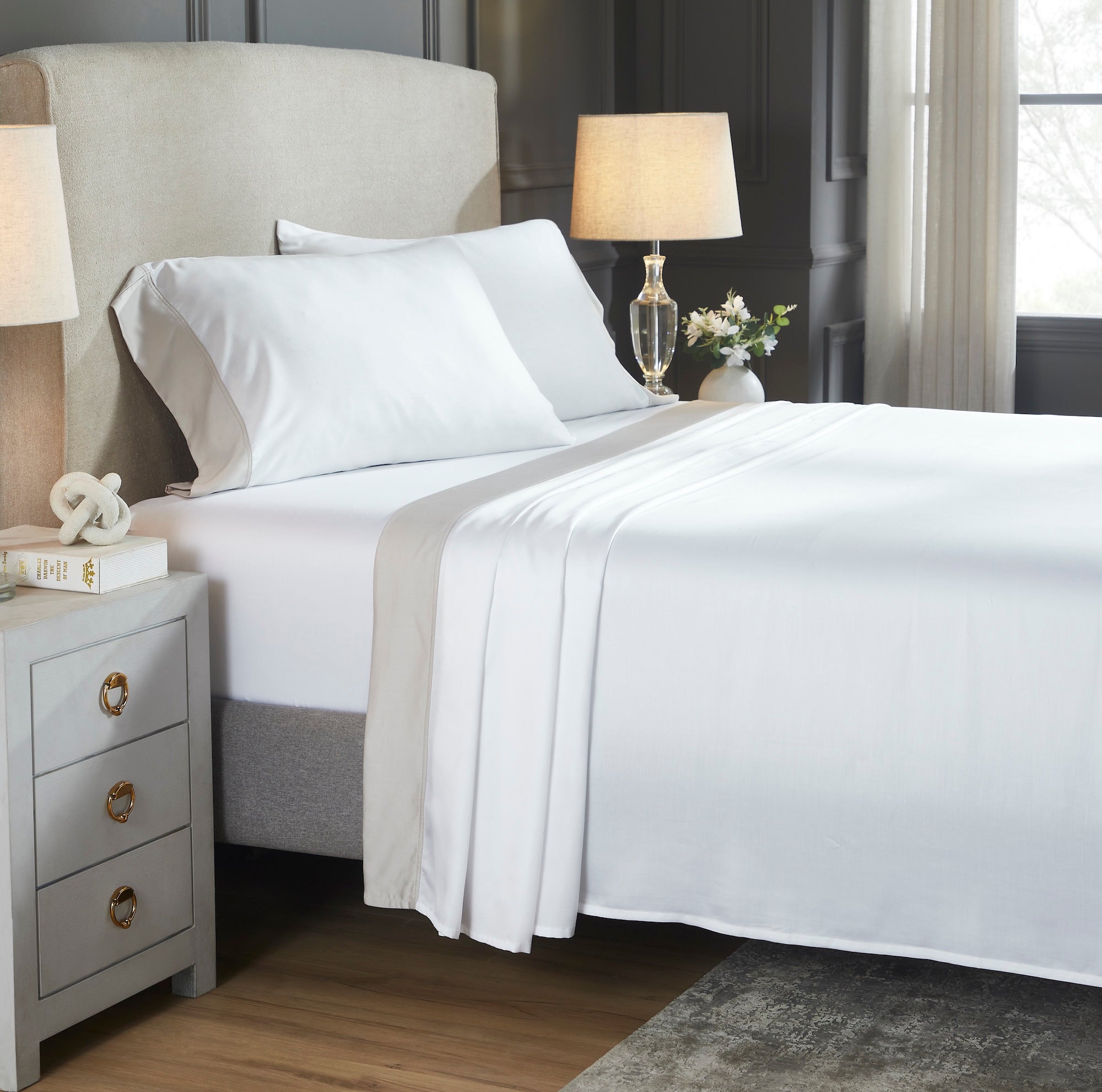 CSS-529-7284_2|Neatly made bed with crisp white 100% Lyocell sheet set & beige border, luxury breathable bedding comfort.