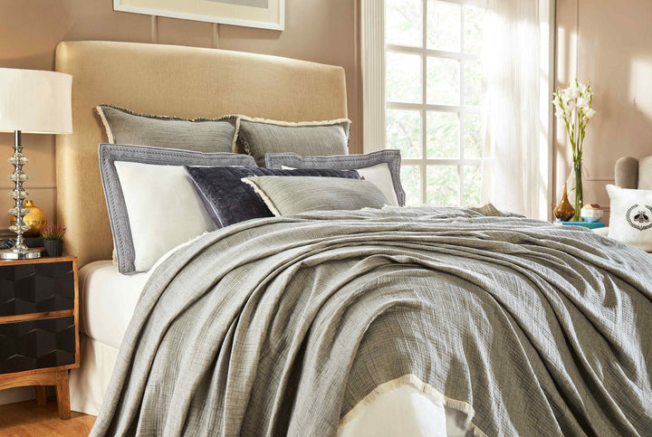 BT-104-11096_1|Stylish gray textured blanket and pillows adorning a bed, providing comfort and a modern touch to the bedroom decor.