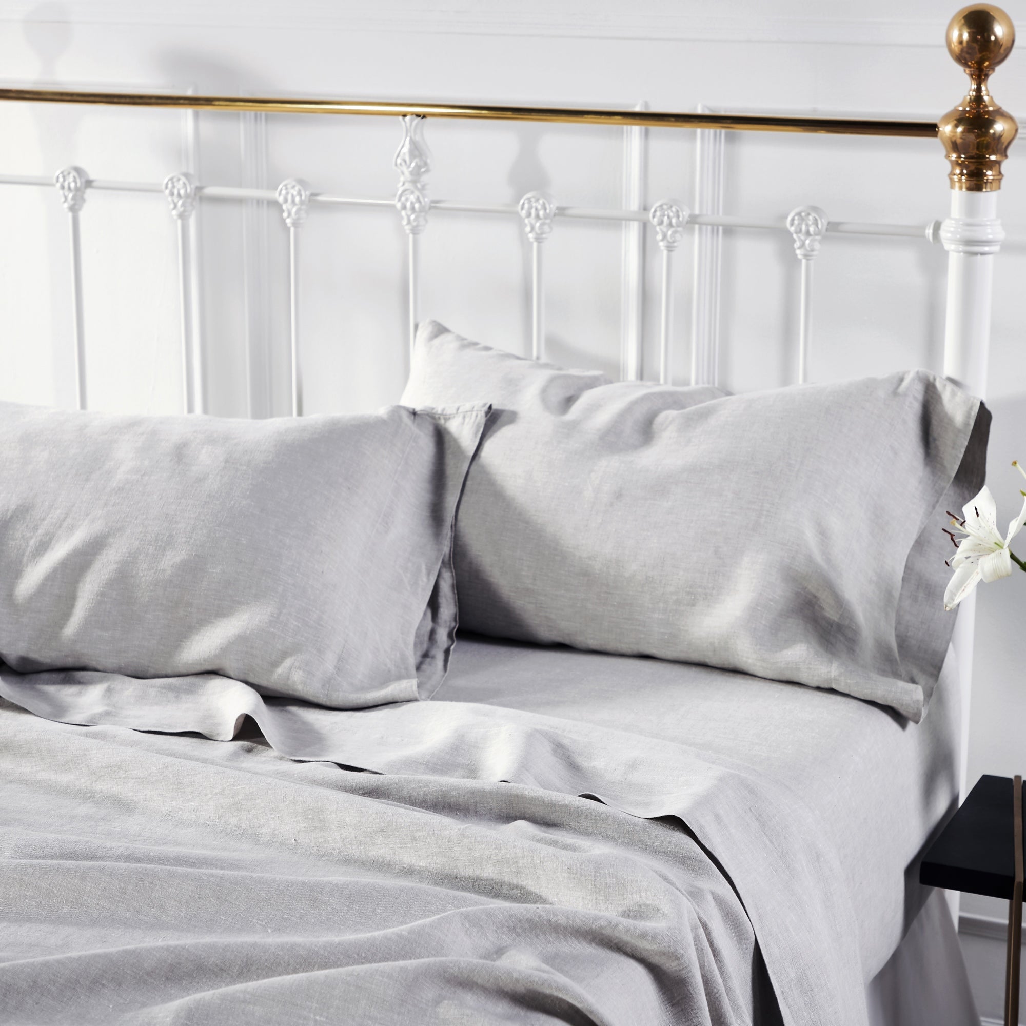 QSS-516-6080_3|Close-up of soft, light grey 100% linen sheets, highlighting their luxurious texture and relaxed, breathable elegance.