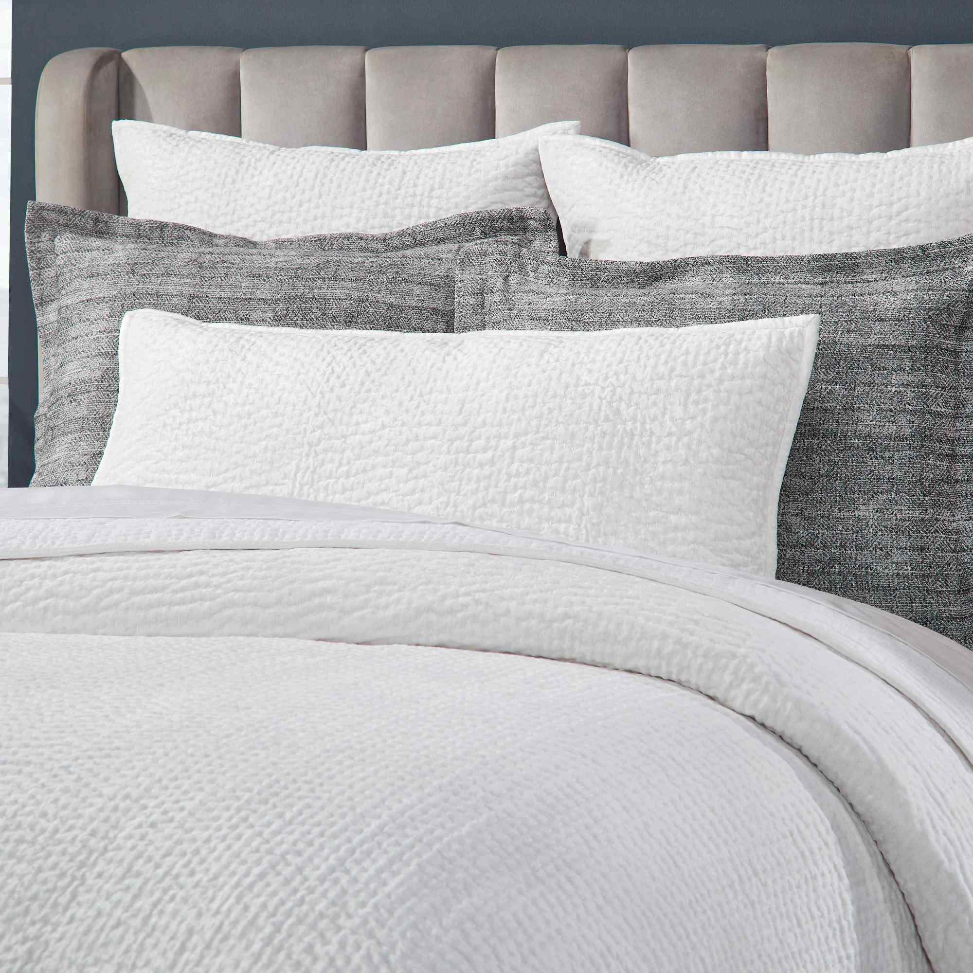 CL-182-11096_11|Elegant white textured waffle knit coverlet set on a modern bed, soft breathable bedding for ultimate comfort.
