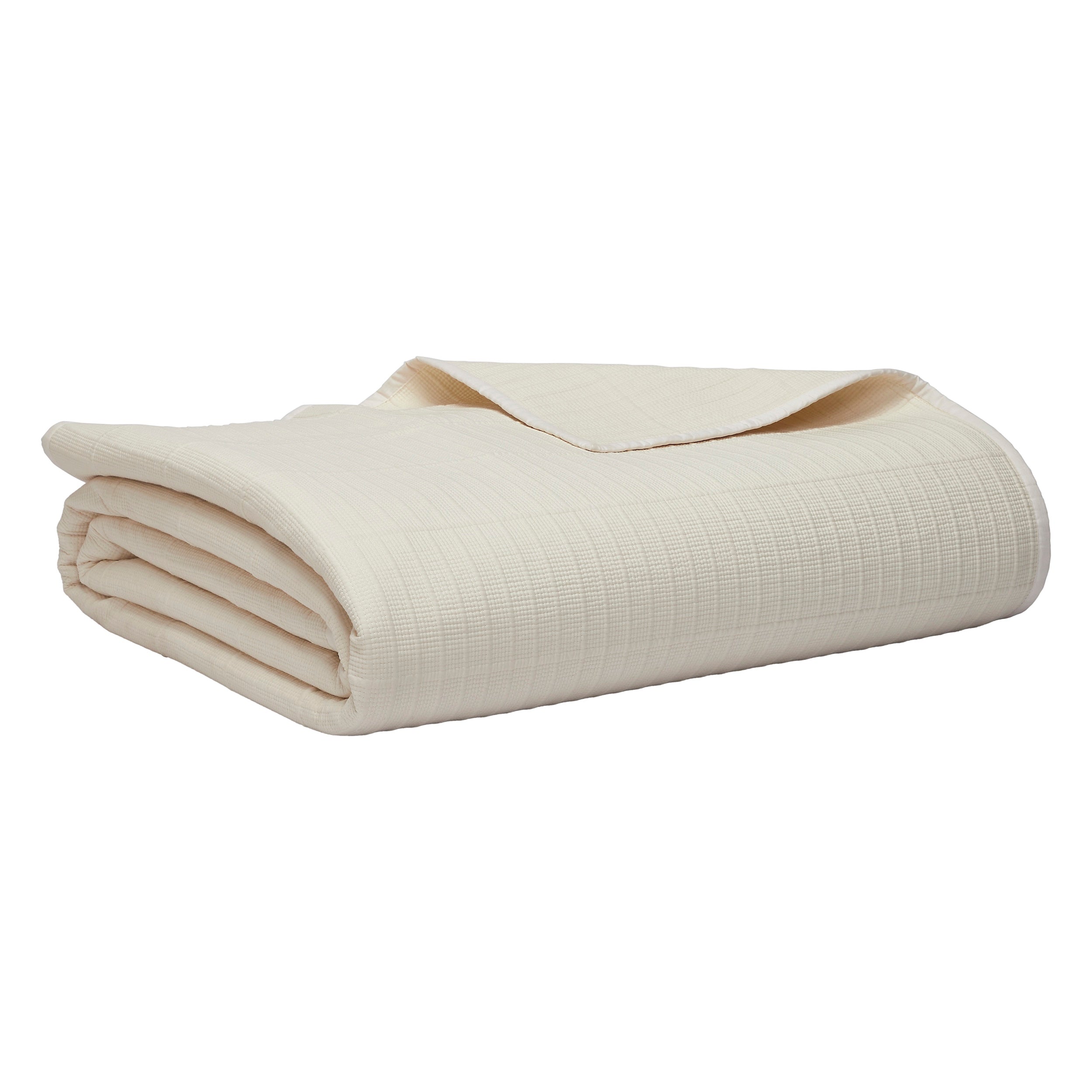 CL-271-9496_10|Neatly folded cream textured coverlet, showcasing its subtle striped weave. Perfect for elegant bedroom organization and storage.