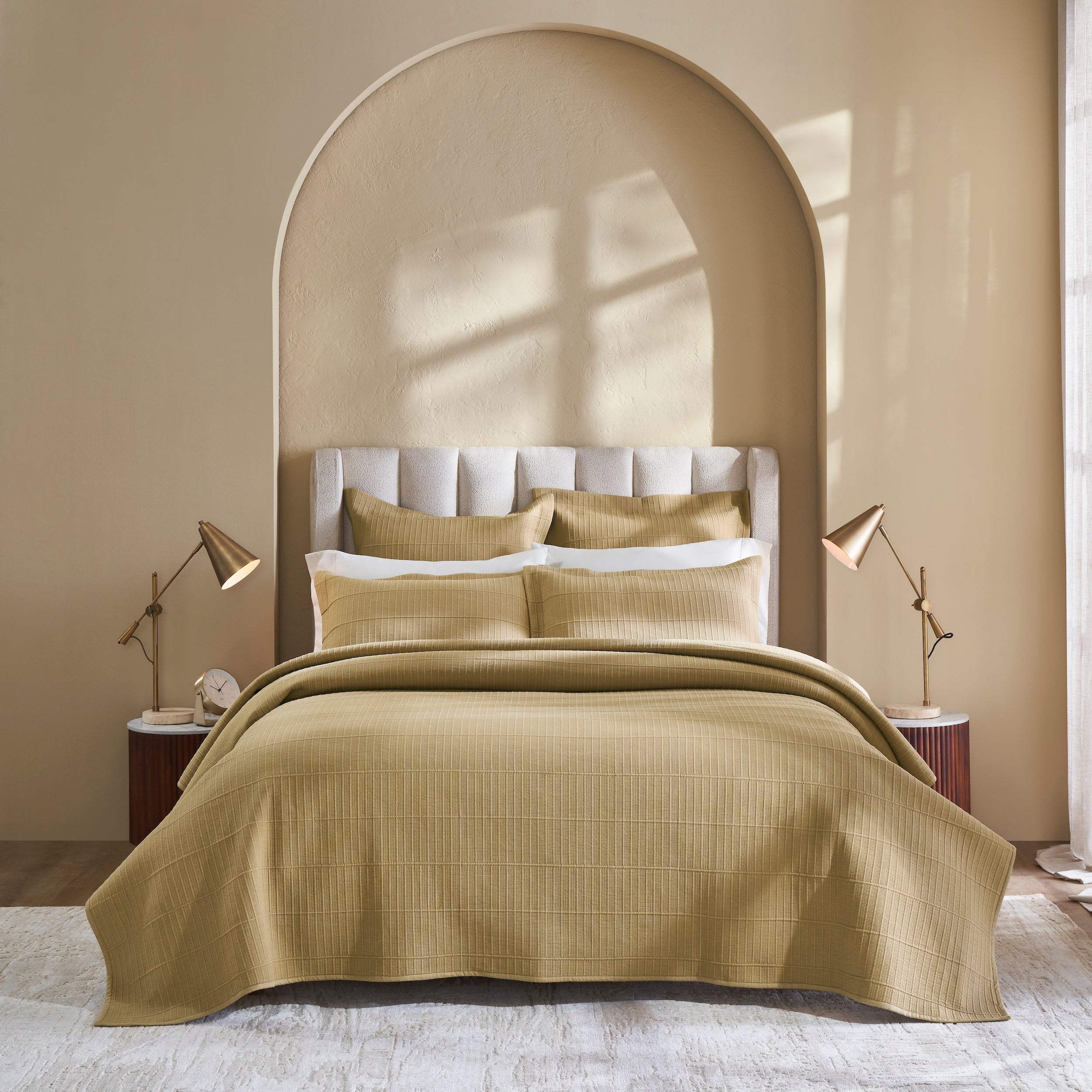 CL-269-11096_2|Gold beige textured quilted coverlet on a bed with matching pillows, enhancing an elegant bedroom's warm ambiance.