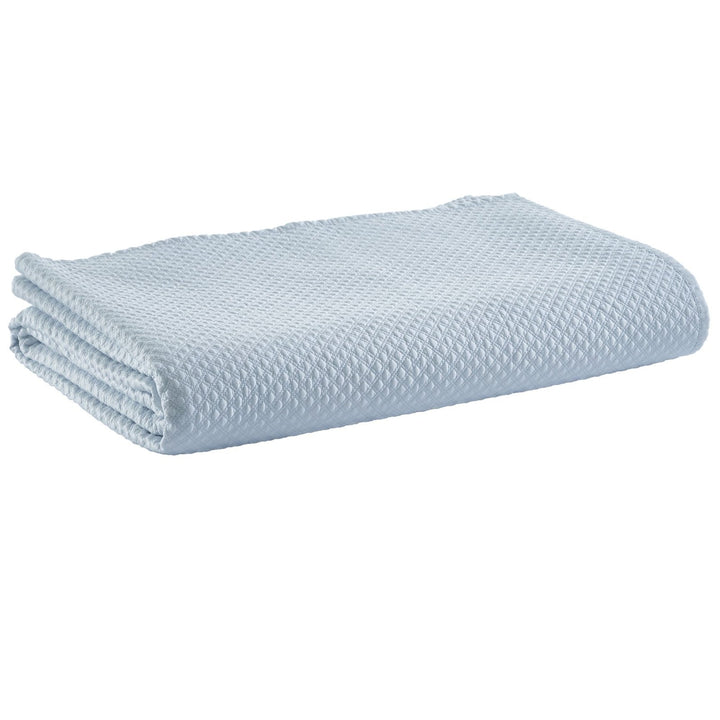 CL-251-9496_5|Neatly folded light blue textured coverlet, perfect for adding tranquil color and a soft layer to any bed.
