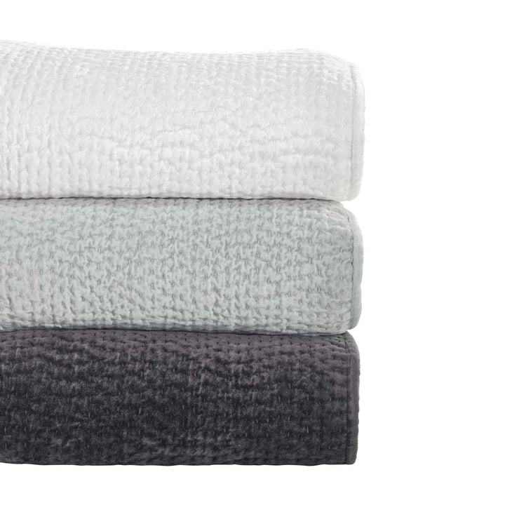 CL-182-11096_7|Stack of three elegant quilted coverlets in white, light gray, and dark gray, soft premium bedding options.