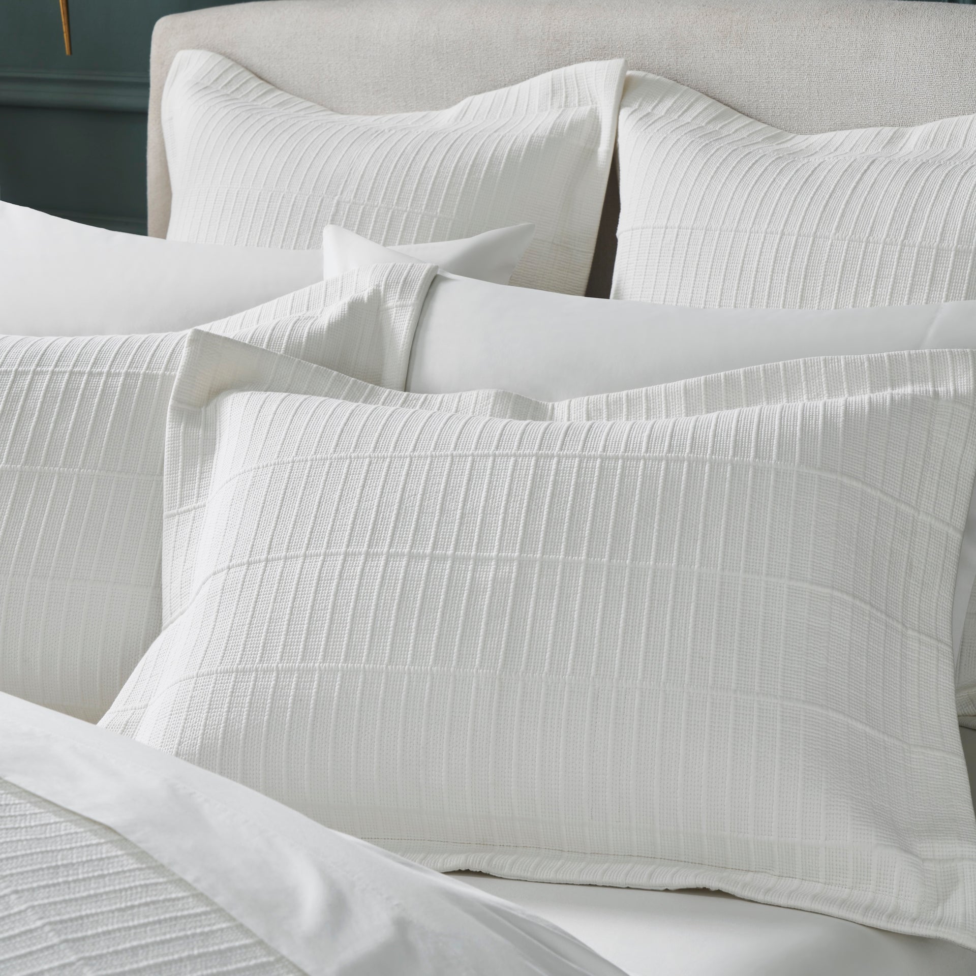 SS-268-X_1|Elegant white textured coverlet with a sophisticated ribbed pattern, providing subtle depth and luxurious comfort for contemporary beds.