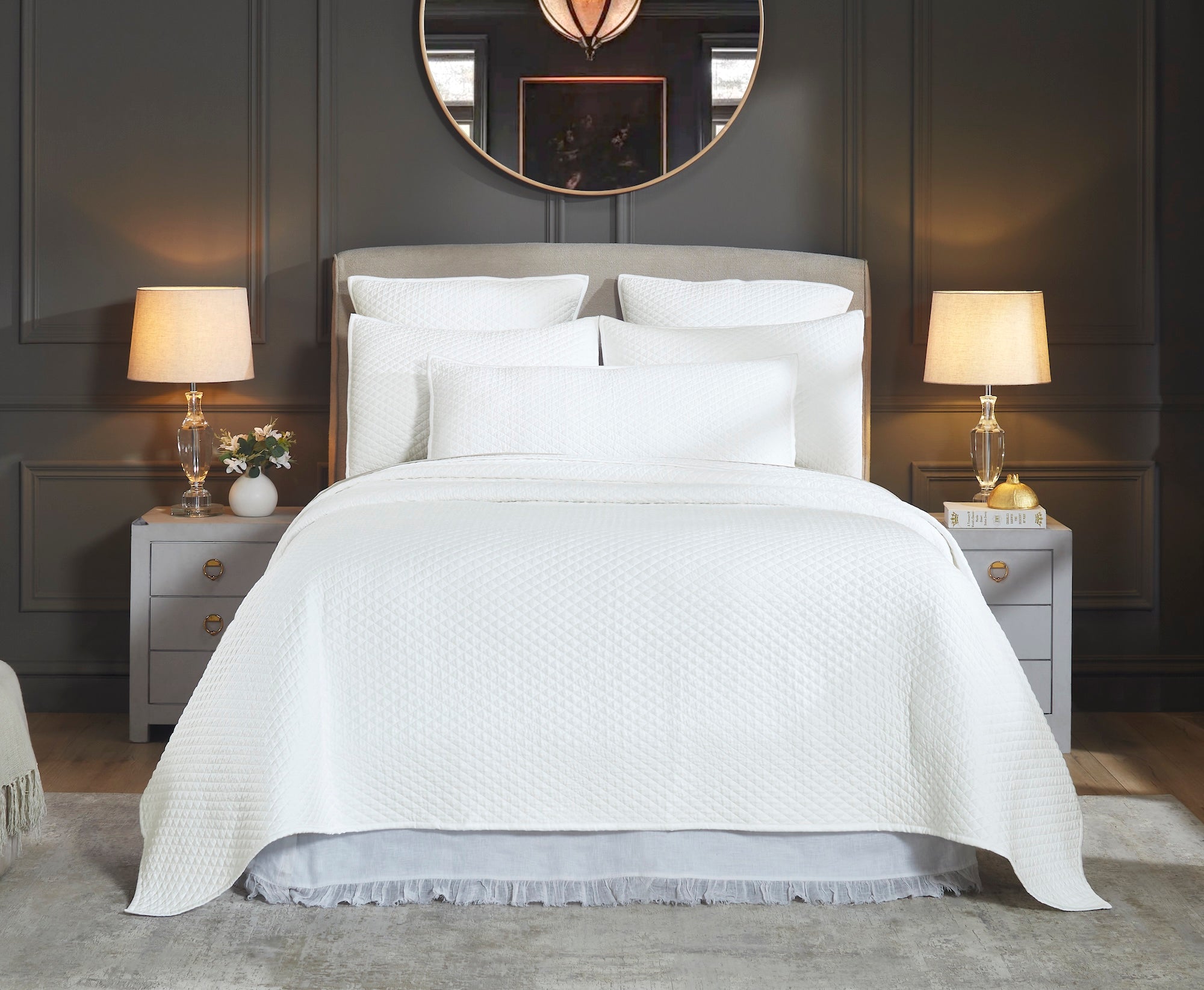 CL-264-X_1|White quilted bedspread with a subtle textured pattern, providing cozy bedding and an elegant touch to any bedroom.