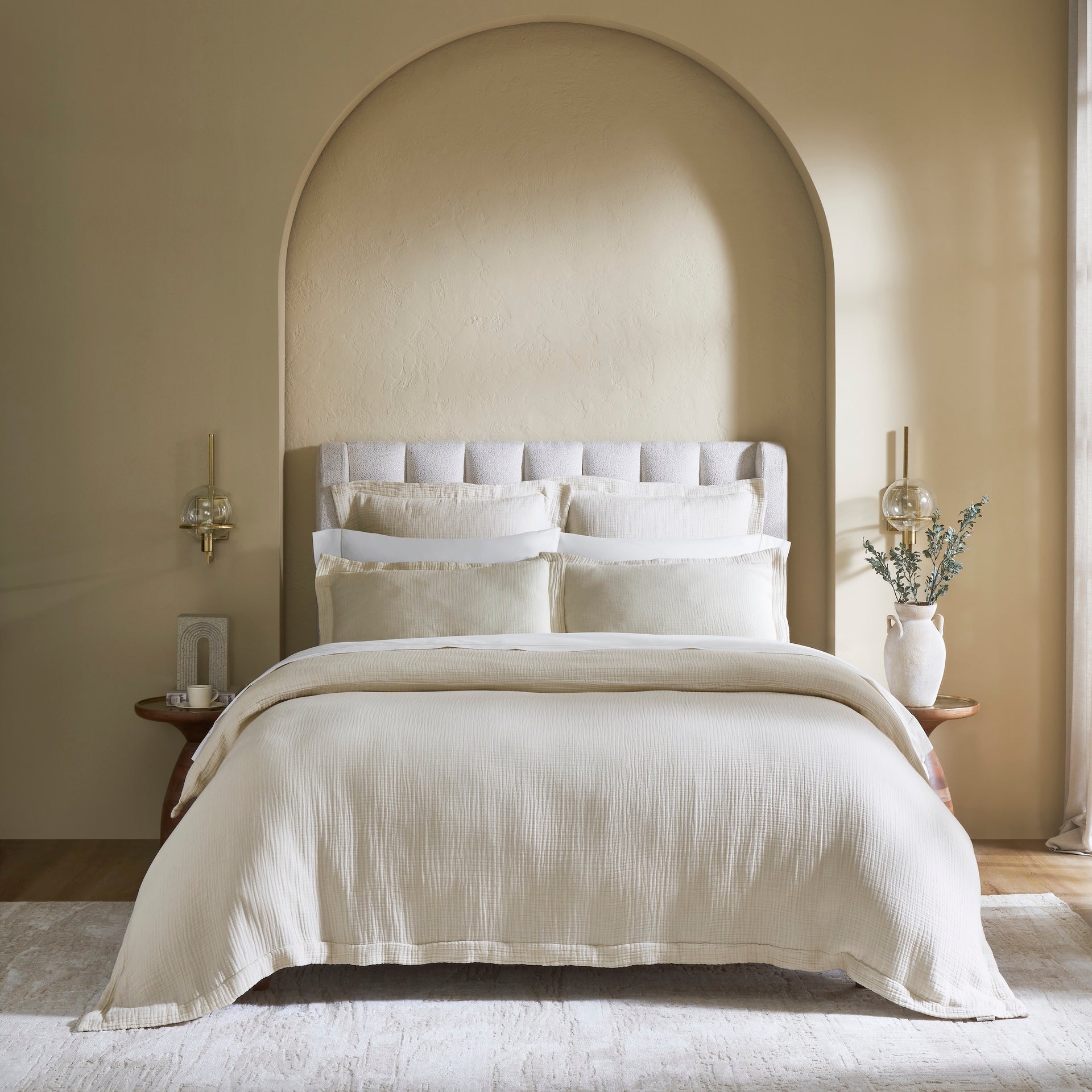 DT-049-10692_1|Elegant cream textured duvet cover adorning a luxurious bed, offering warm, serene, and inviting neutral bedding.