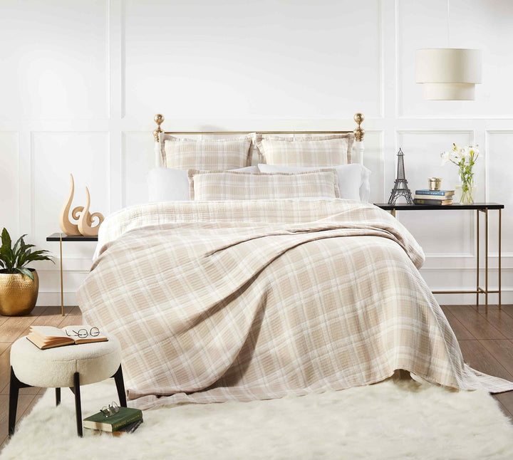 BT-118-9496_1|Soft beige and white plaid patterned cotton quilt blanket draped elegantly over a bed, offering warmth and classic style.